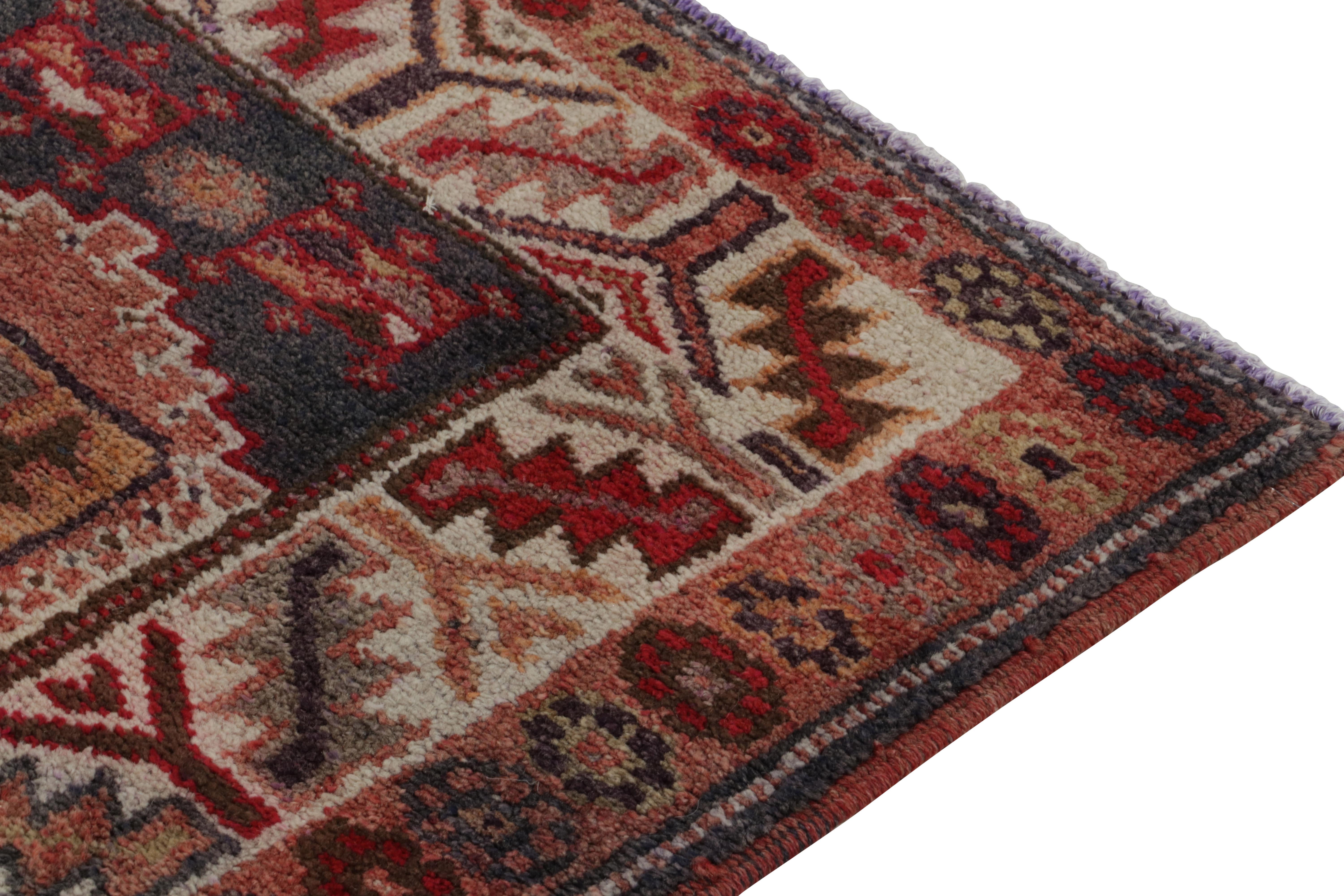 Mid-20th Century Vintage Turkish Tribal Runner in Red with Colorful Geometric by Rug & Kilim For Sale