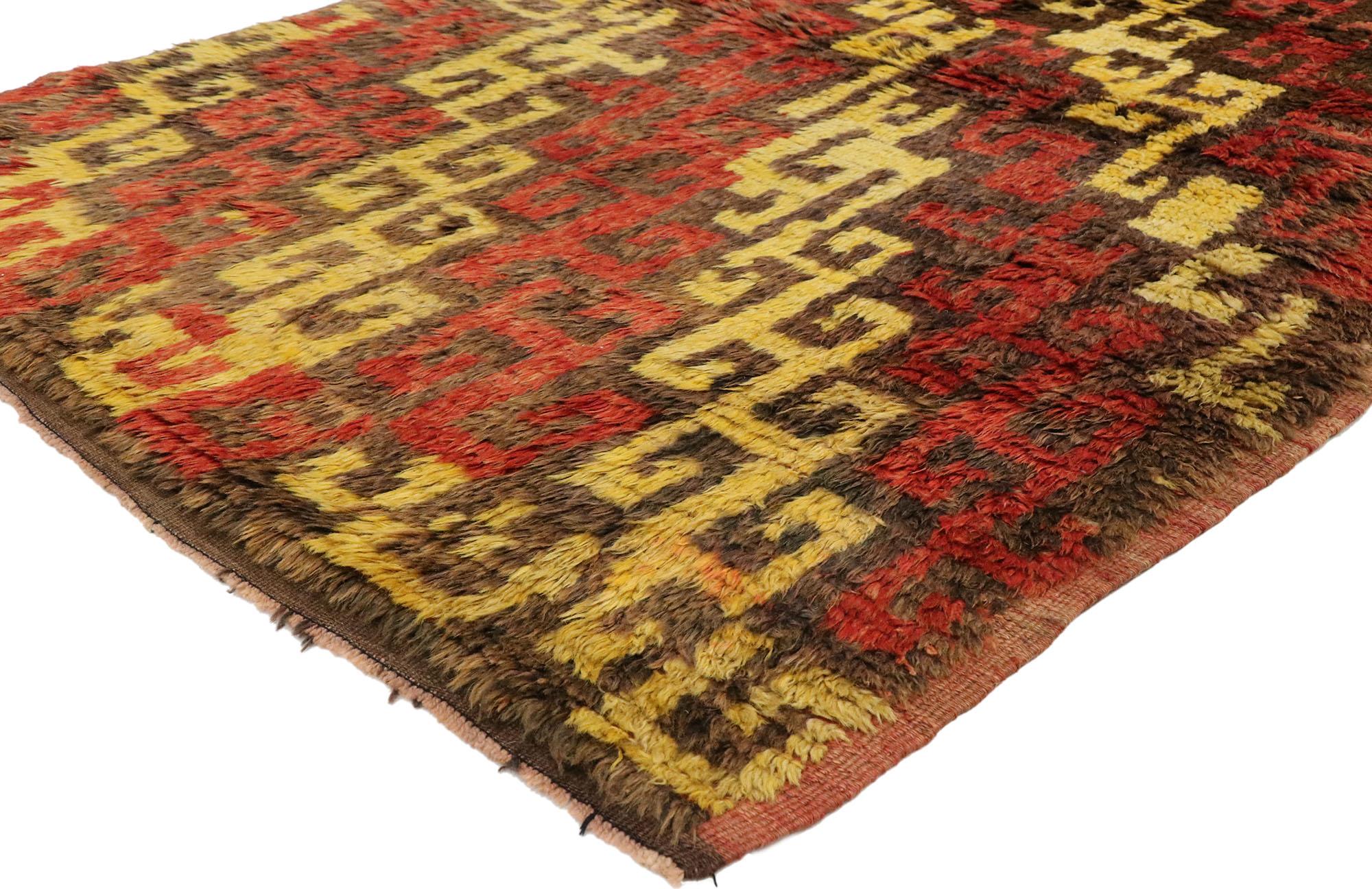 51556, vintage Turkish Tulu accent rug with Mid-Century Modern Tribal style. This hand knotted wool distressed vintage Turkish Tulu rug with Mid-Century Modern and Tribal style is composed of diagonal rows of Ram's Horn motifs in alternating colors