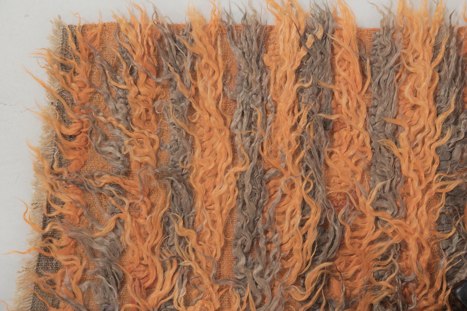 Tulu is a gorgeous wool shag that features amazing alternate layers of brown and vibrant orange. It augments the stunning scenery and all will be loved by the next generation. Turkish Anatolian rugs weave together dyes and colors, motifs, textures,