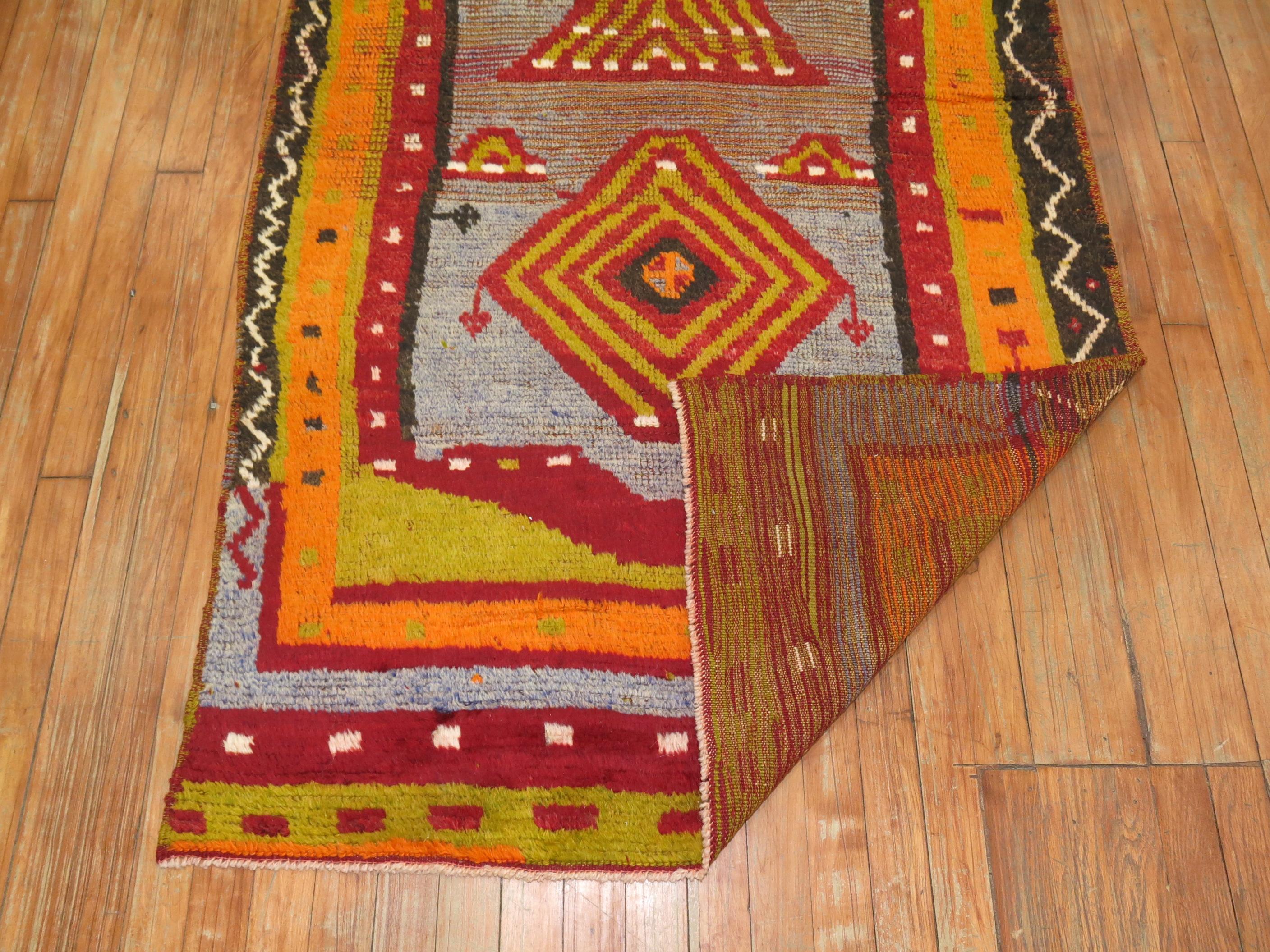 Dazzling and Auspicious best describe this Turkish rug with fuzzy angora wool.

Measures: 3'6'' x 5'9''.