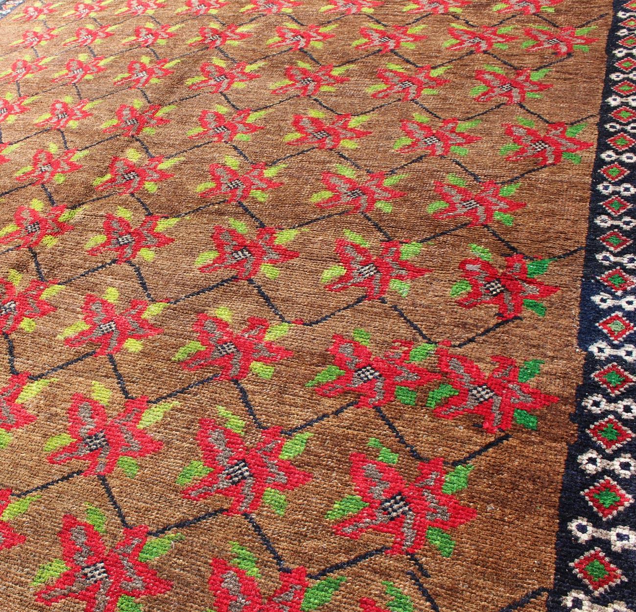 Wool Vintage Turkish Tulu Rug with a Modern Design with Poinsettia Flower Design For Sale