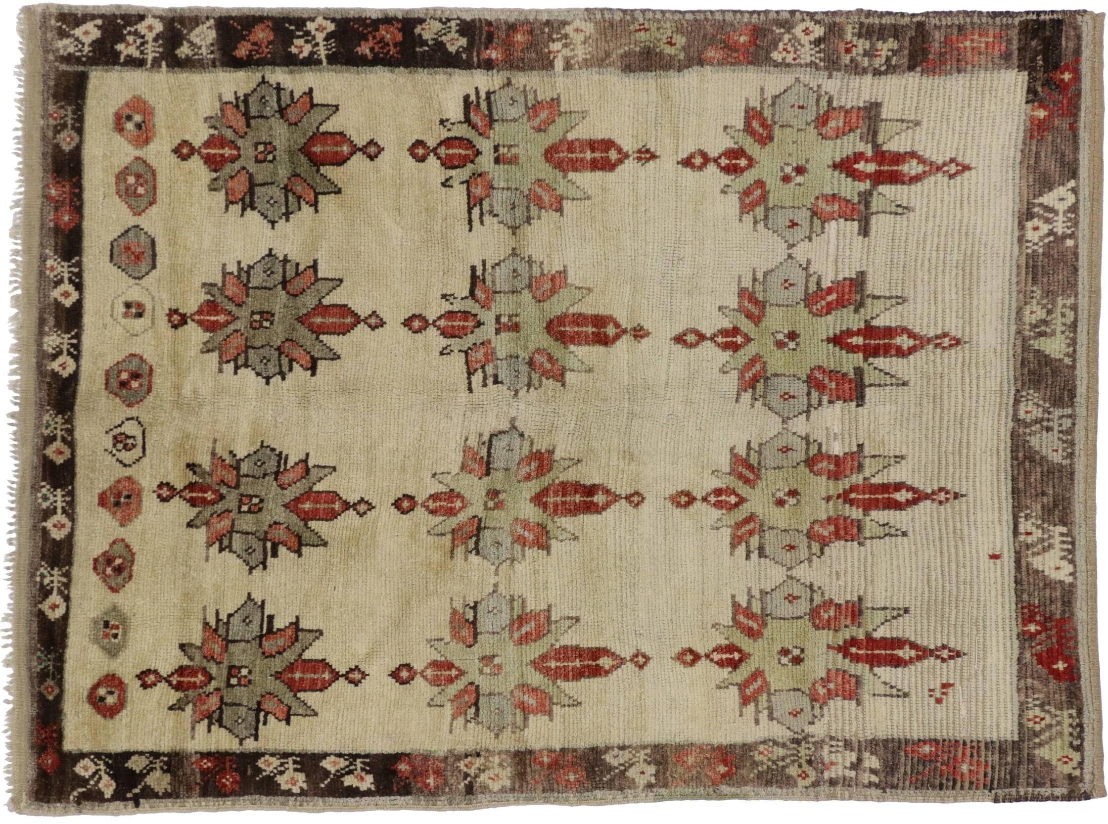 51087, vintage Turkish Tulu rug with modern tribal style. A vintage hand-knotted wool Turkish Tulu rug featuring an allover geometric pattern in an open abrashed field with a neutral palette of soft colors rendered in brown, taupe, rustic red, gray,
