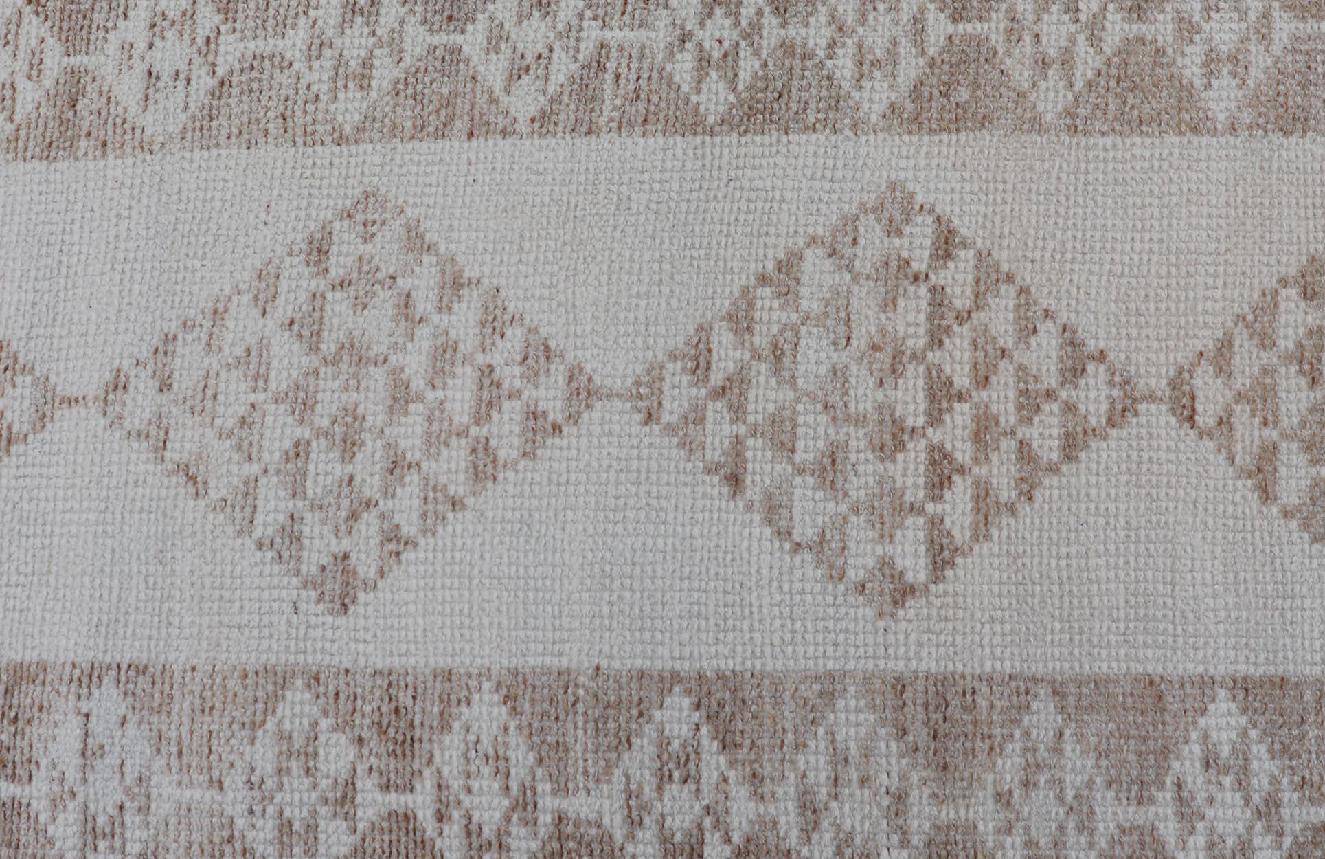Measures: 2'6 x 11'10 Vintage Turkish Tulu Runner -Neutral Tones and Geometric Diamond Patterns Keivan Woven Arts / Rug / EN-15787 Country of origin / type: Turkey / Tulu exquisite vintage Turkish Tulu runner embodies the timeless elegance of