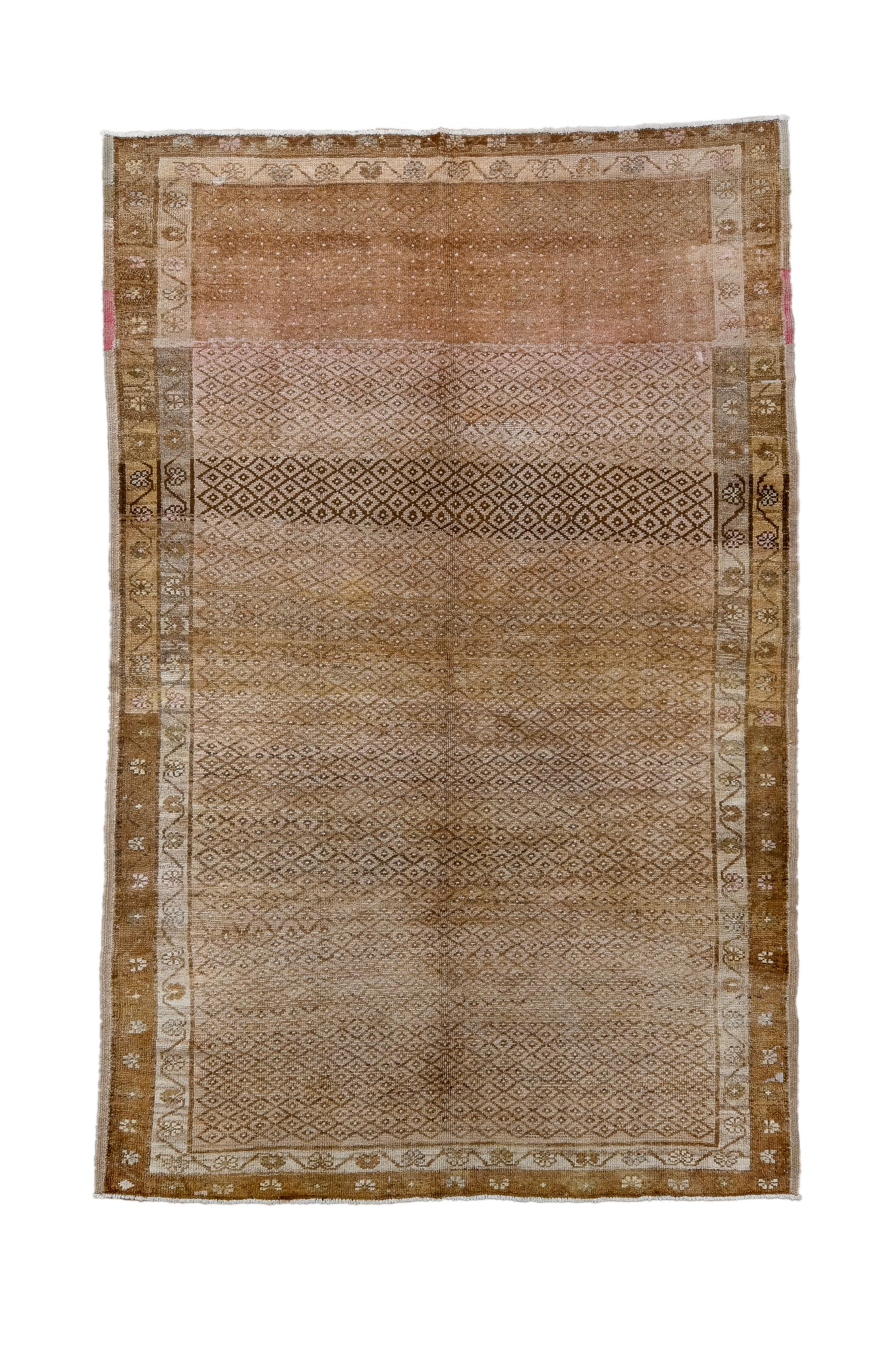 Not an Oushak, but a village weaving, probably closer to central Turkey, with a field panel abrashing from light brown to dark chocolate, with a very close overall pattern of little lozenges. Abrashed borders, both with reversing fan palmettes on a