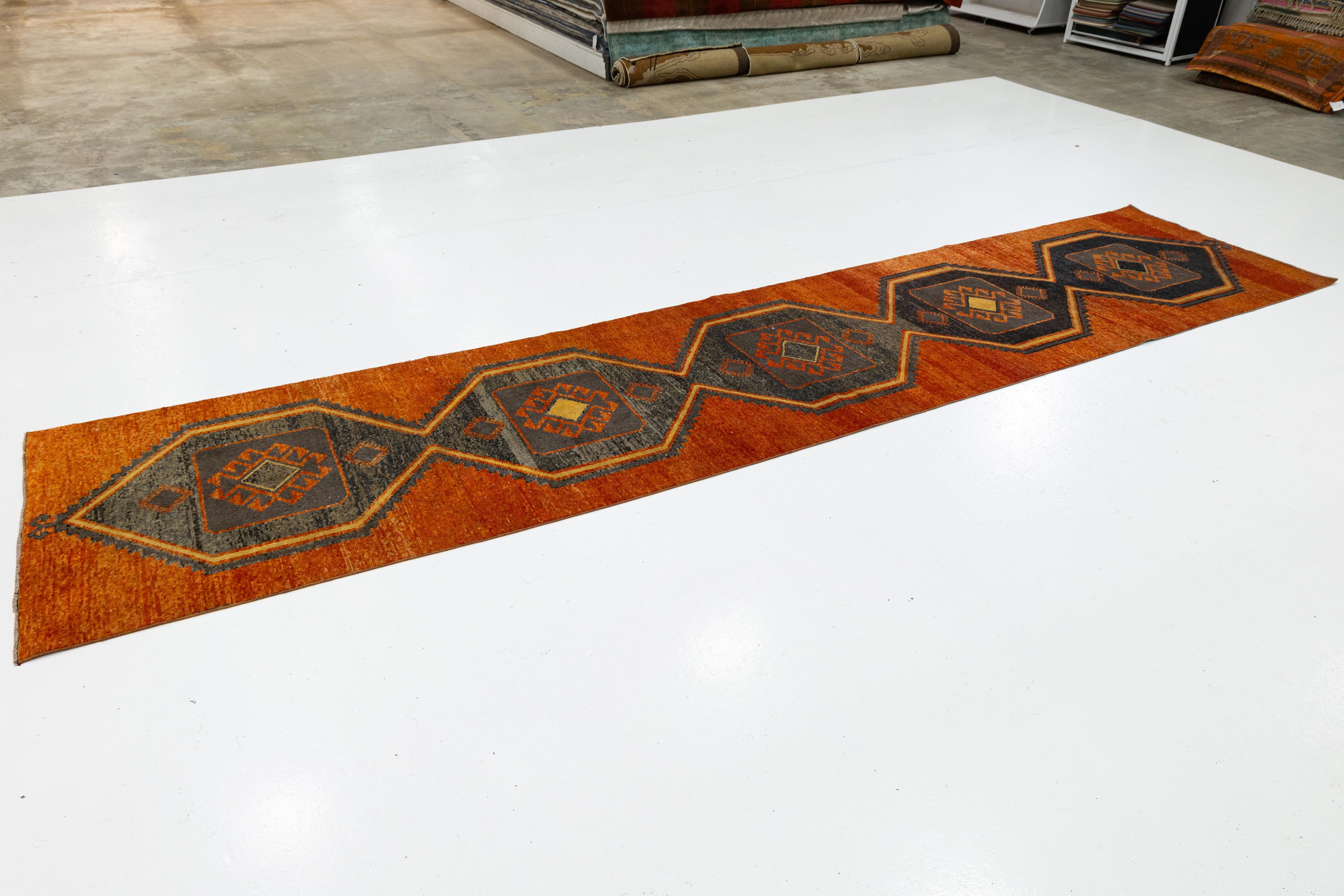 Hand-Knotted Vintage Turkish Wool Runner In Gray and Orange with Hexagonal Tribal Motifs For Sale
