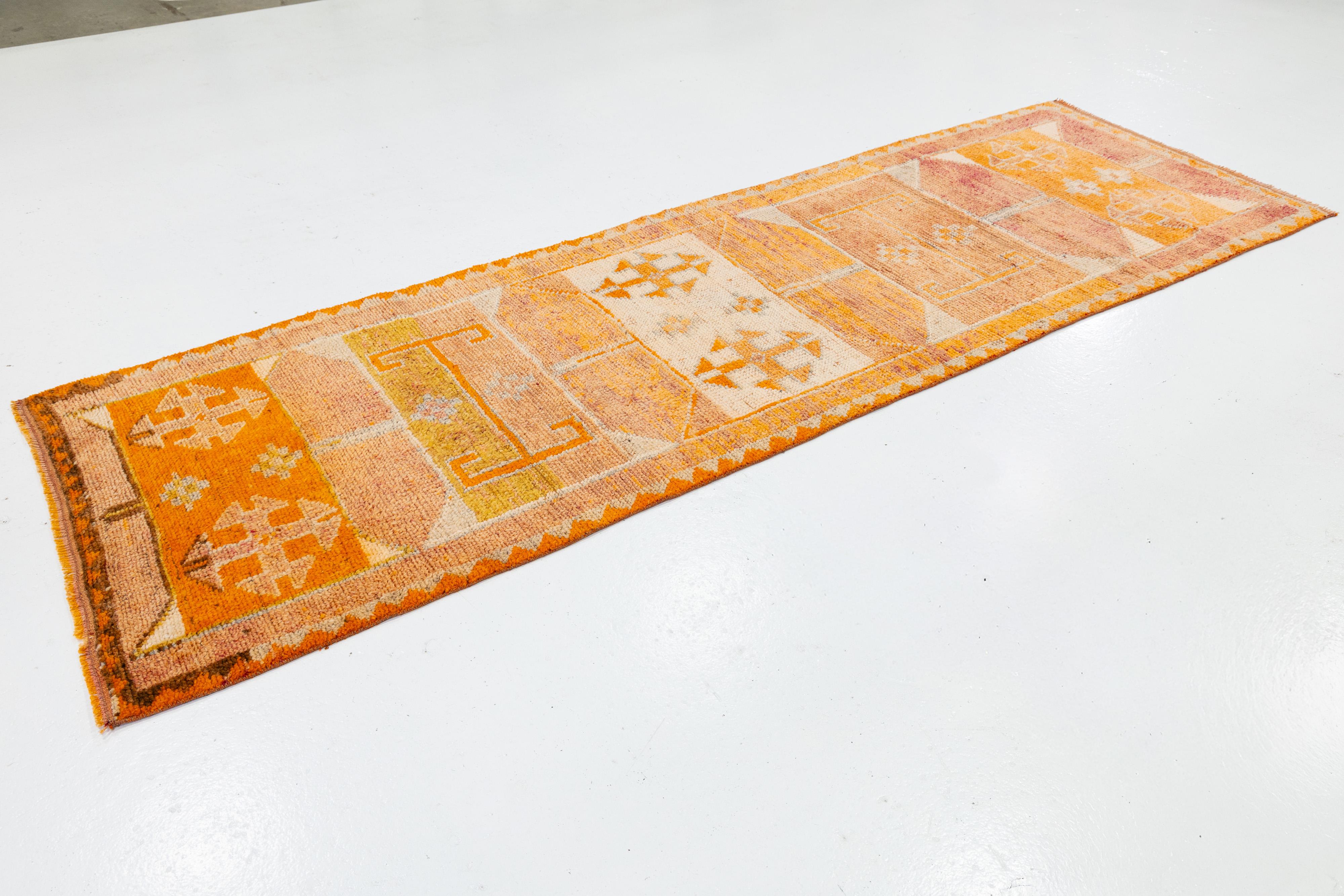 Hand-Knotted Vintage Turkish Wool Runner In Orange with Tribal Diamond Motifs For Sale
