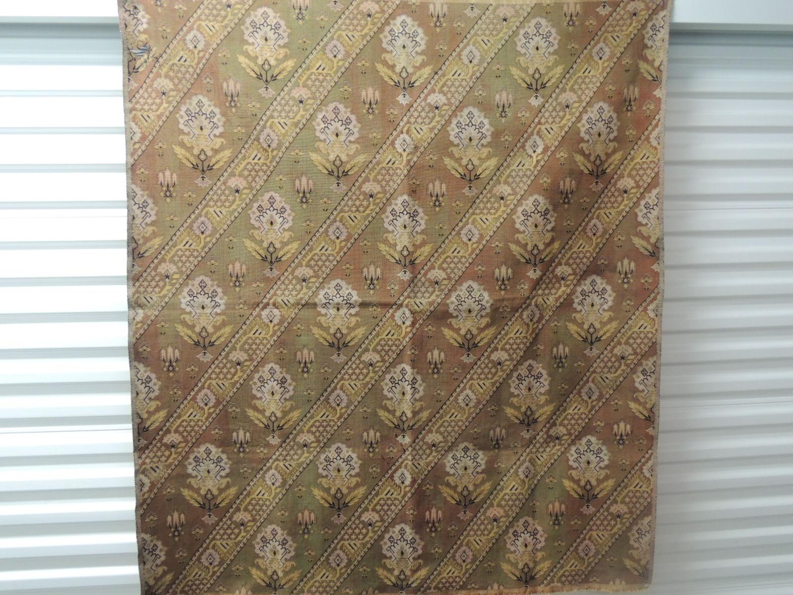 Antique Textile Collection:
Vintage Turkish Woven Floral Tapestry Panel. Depicting flowers and vines in shades of yellow, soft orange and green.
Could use for upholstery or as a wall hanging.
Sold as is.
Size: 49 W x 56 L