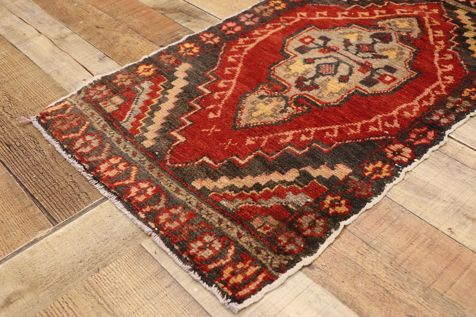 51822 Vintage Turkish Yastik Rug, 01'08 x 02'10. This hand-knotted wool vintage Turkish Yastik rug is a striking piece that exudes a rich cultural heritage through its bold colors and intricate patterns. The vibrant red field immediately draws the