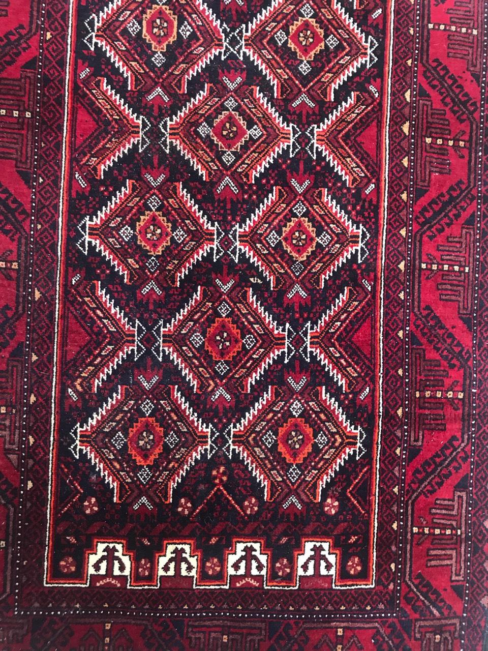 20th century tribal Turkmen Baluch rug from Afghanistan, with a beautiful geometrical design and red and black colors, entirely hand knotted with wool velvet on wool foundation.

✨✨✨
