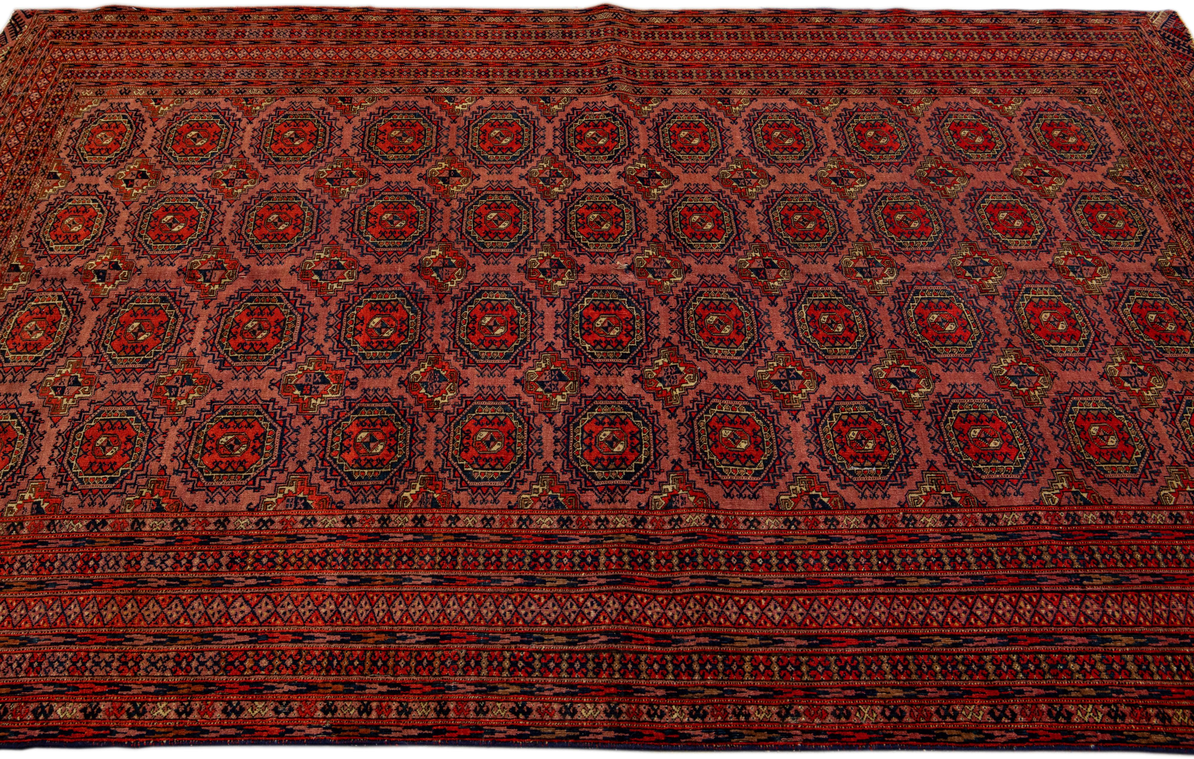 Vintage Turkmen Handmade Geometric Persian Wool Rug with Terracotta Color In Excellent Condition For Sale In Norwalk, CT