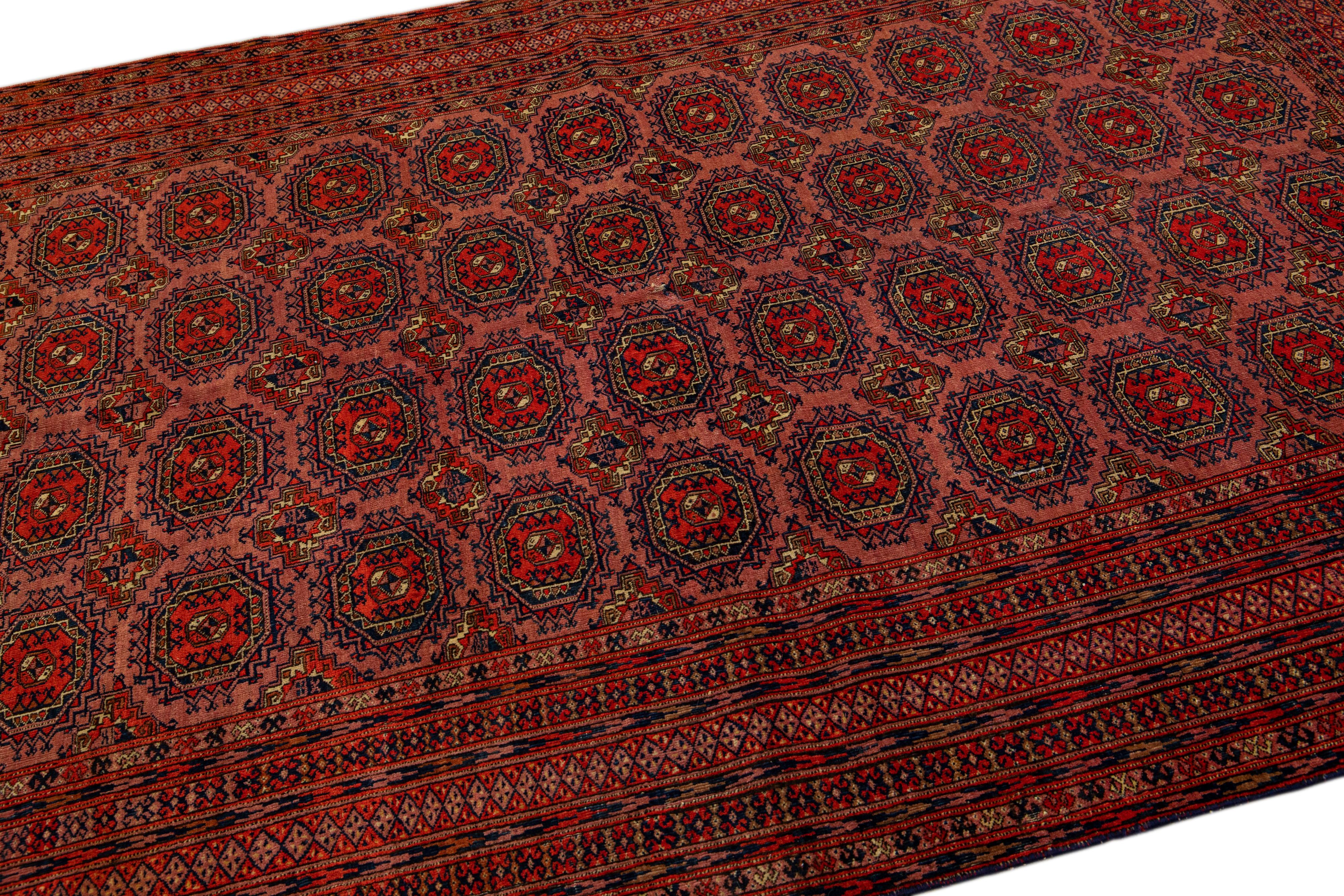 Vintage Turkmen Handmade Geometric Persian Wool Rug with Terracotta Color For Sale 2