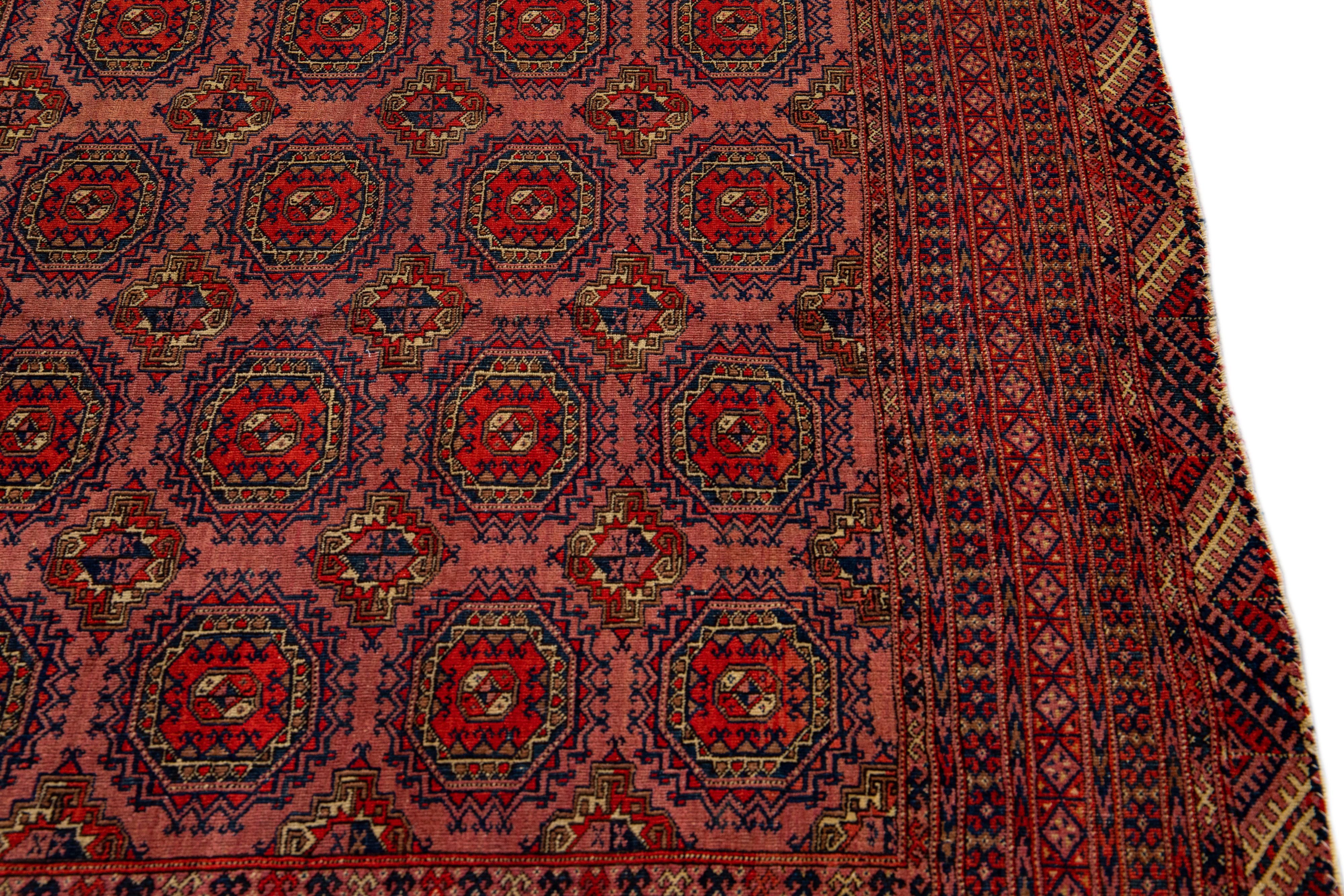 Vintage Turkmen Handmade Geometric Persian Wool Rug with Terracotta Color For Sale 3
