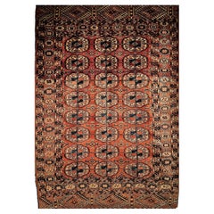Vintage Turkmen Tekke Area Rug, Hand-Knotted Wool Pile, Brick-Red, Early 1900s