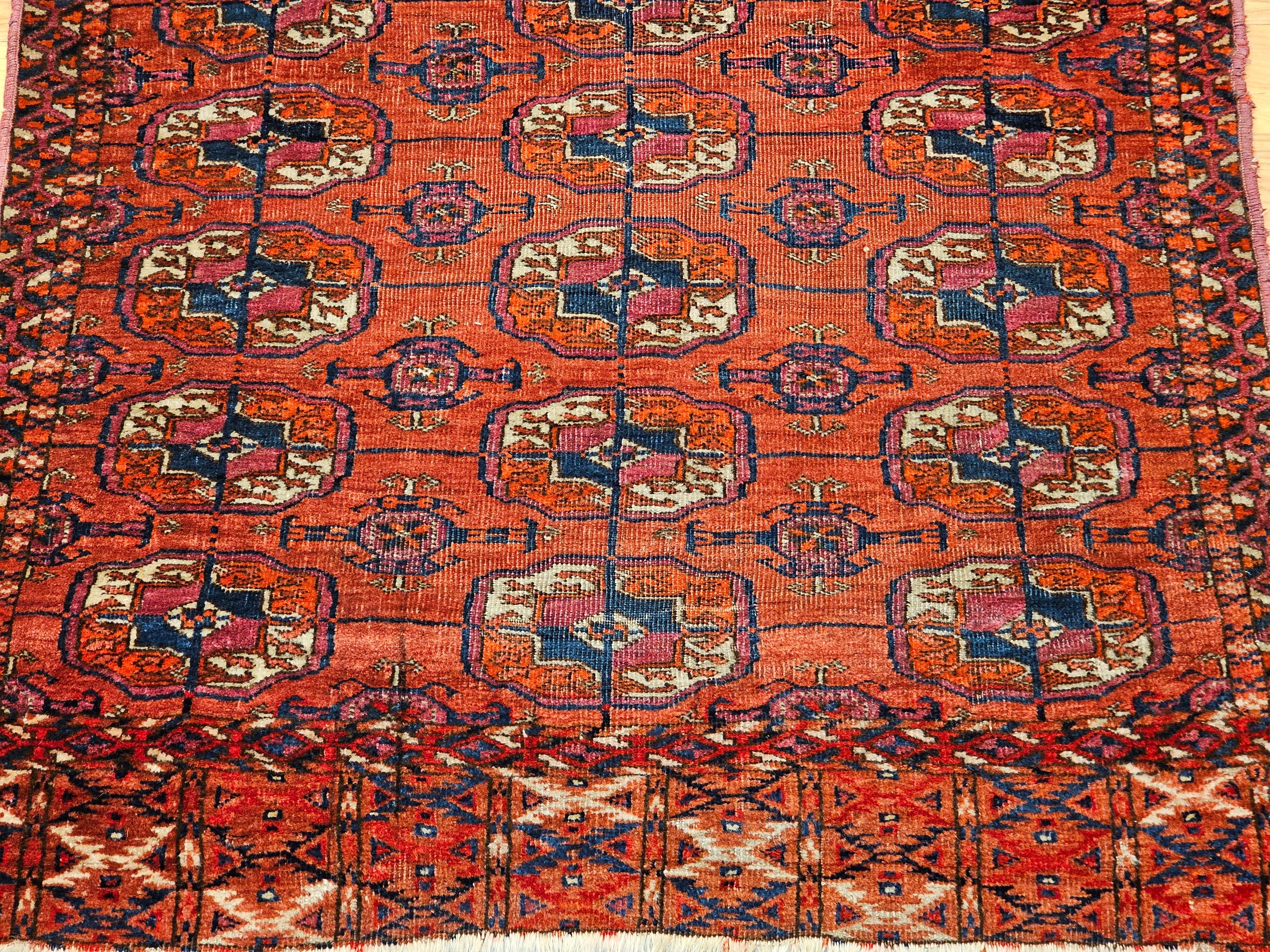 Vegetable Dyed Vintage Turkmen Tekke in Allover Geometric Pattern in Red, Navy, Ivory, Blue For Sale