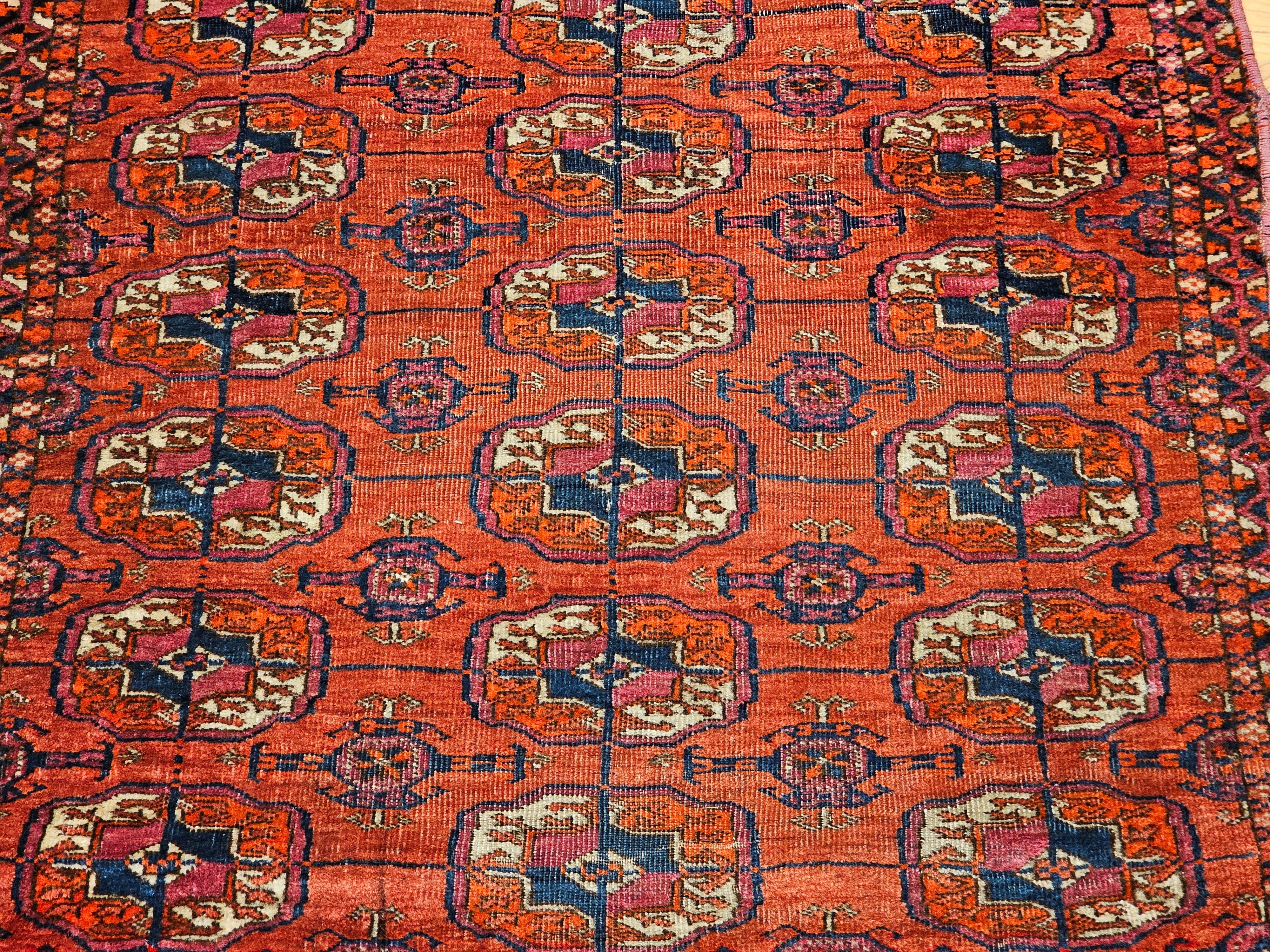 Vintage Turkmen Tekke in Allover Geometric Pattern in Red, Navy, Ivory, Blue In Good Condition For Sale In Barrington, IL
