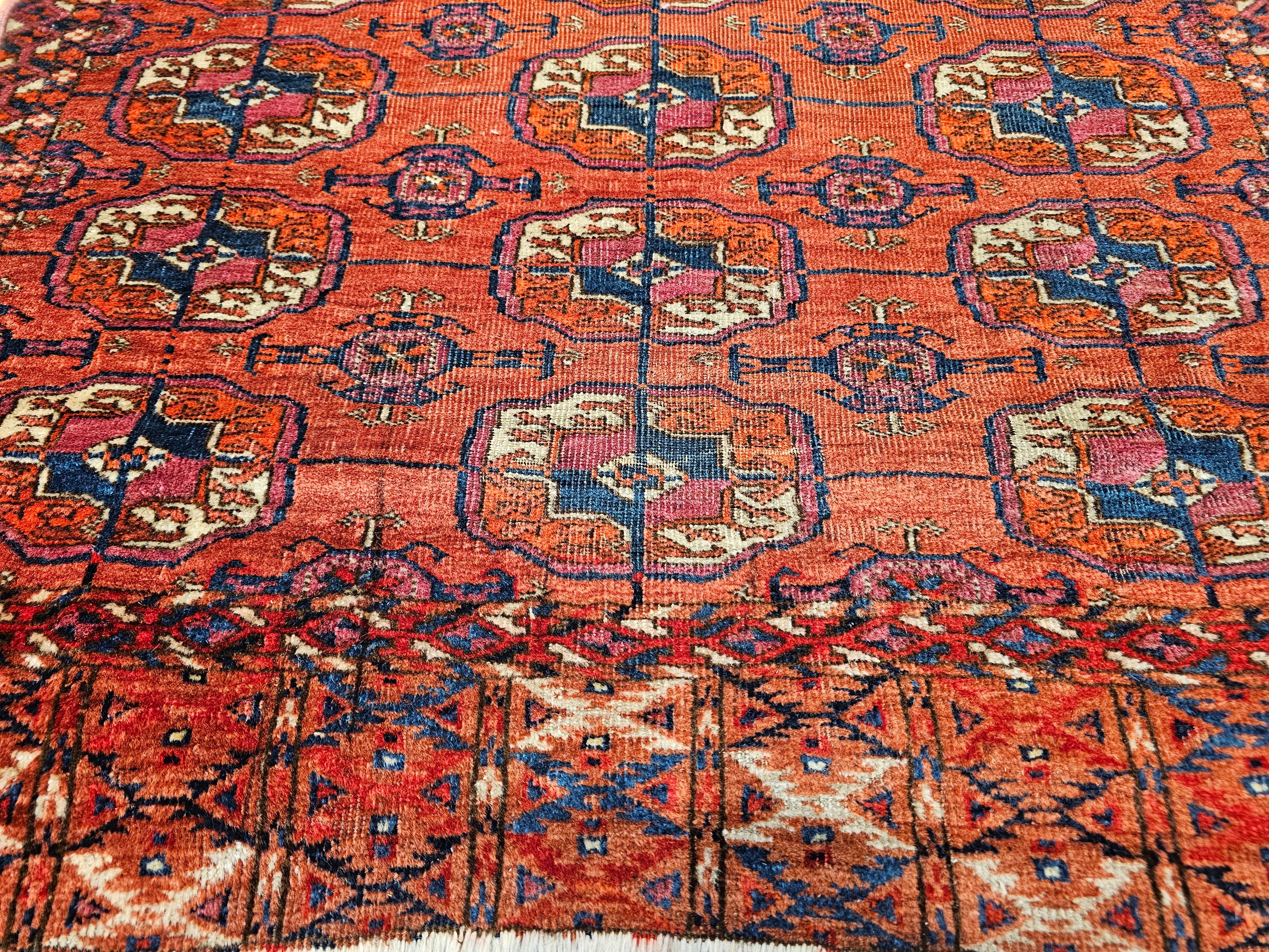 Wool Vintage Turkmen Tekke in Allover Geometric Pattern in Red, Navy, Ivory, Blue For Sale