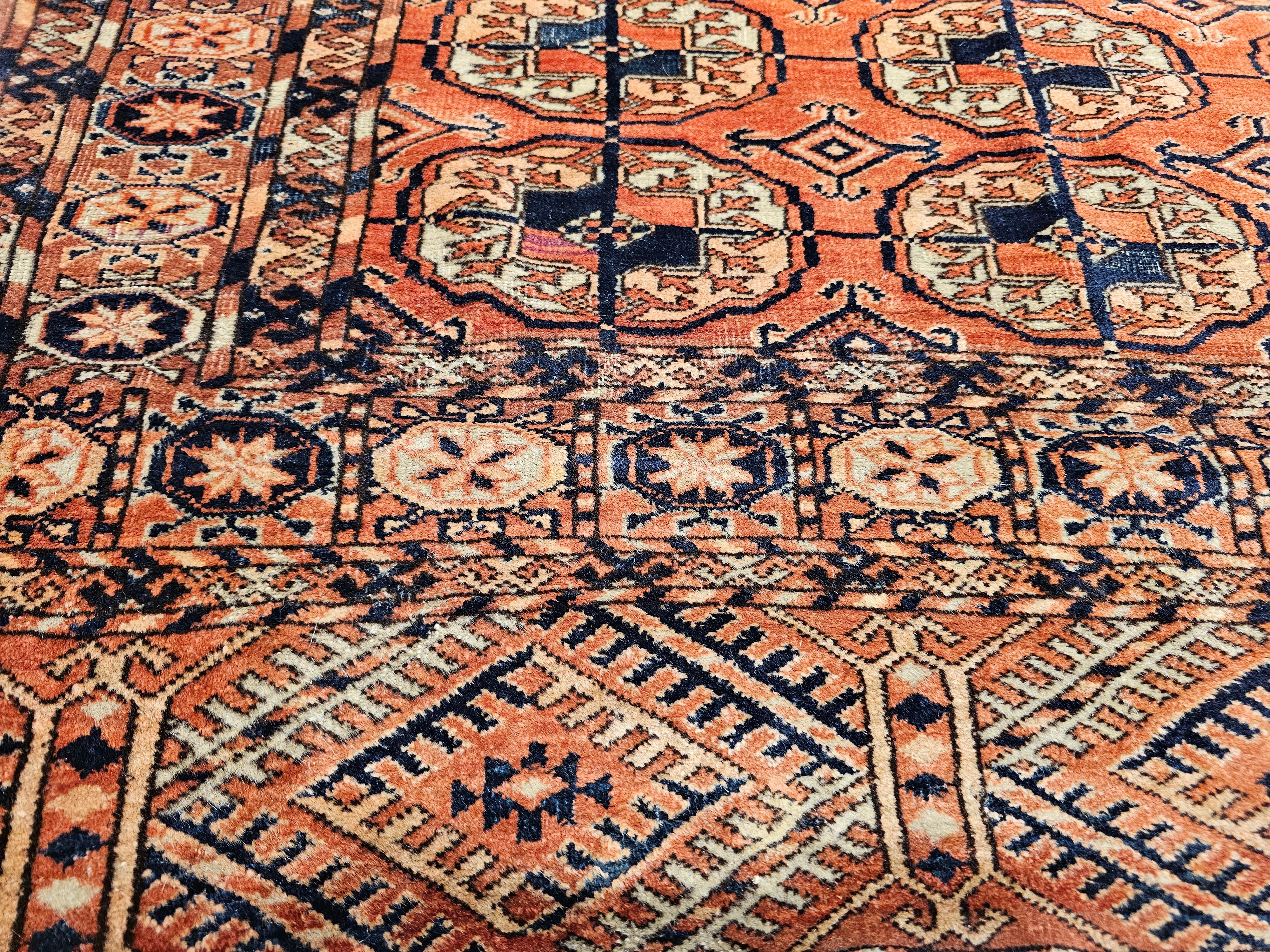 Vintage Turkmen Tekke in Allover Pattern in Brick-Red, Navy, Ivory, Blue, Yellow For Sale 1
