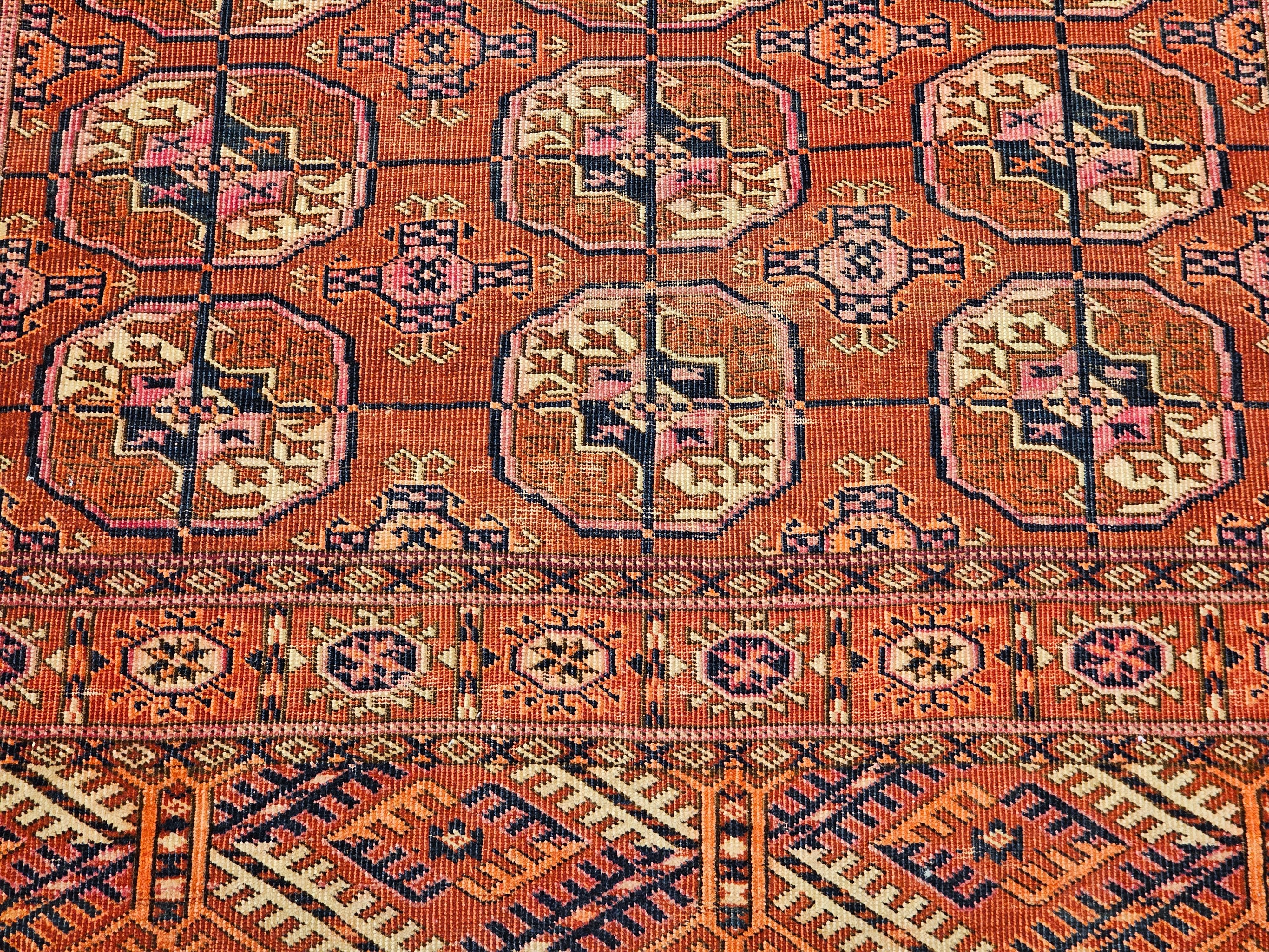 Wool Vintage Turkmen Tekke in Allover Pattern in Brick-Red, Navy, Yellow, Pink, Ivory For Sale
