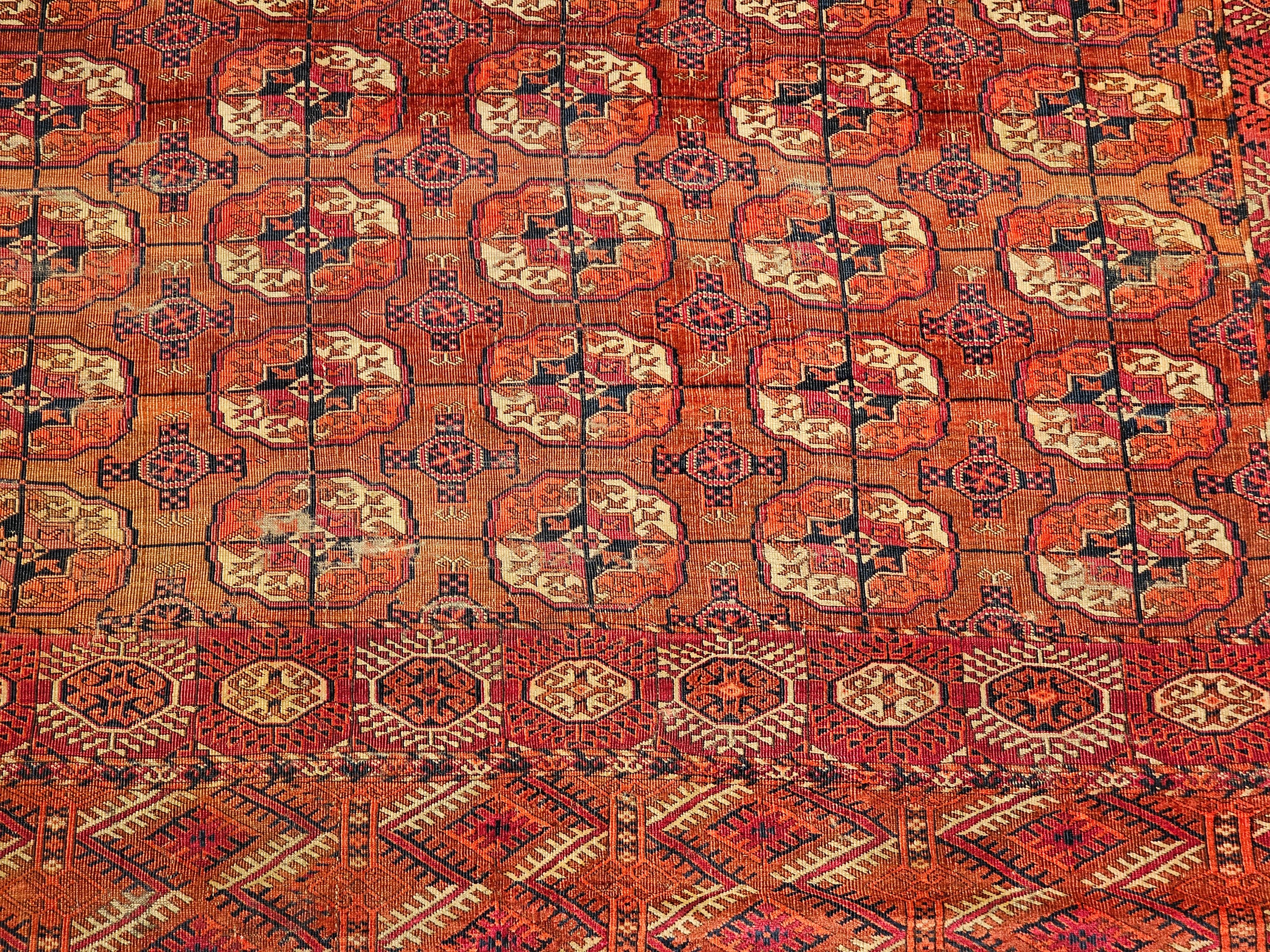 Wool Vintage Turkmen Tekke in Allover Pattern in Red, Navy, Ivory, Crimson, Blue For Sale