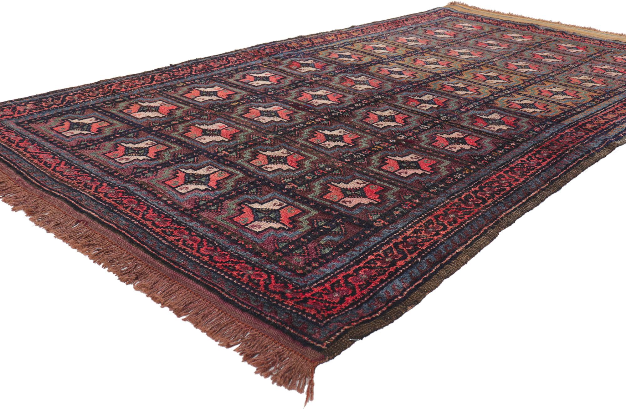 61222 vintage Persian turkoman rug, 04'00 x 07'02.
With its nomadic charm and tribal style, this hand knotted wool vintage turkoman rug is a captivating vision of woven beauty. The compartmental design and earthy colorway woven into this vintage