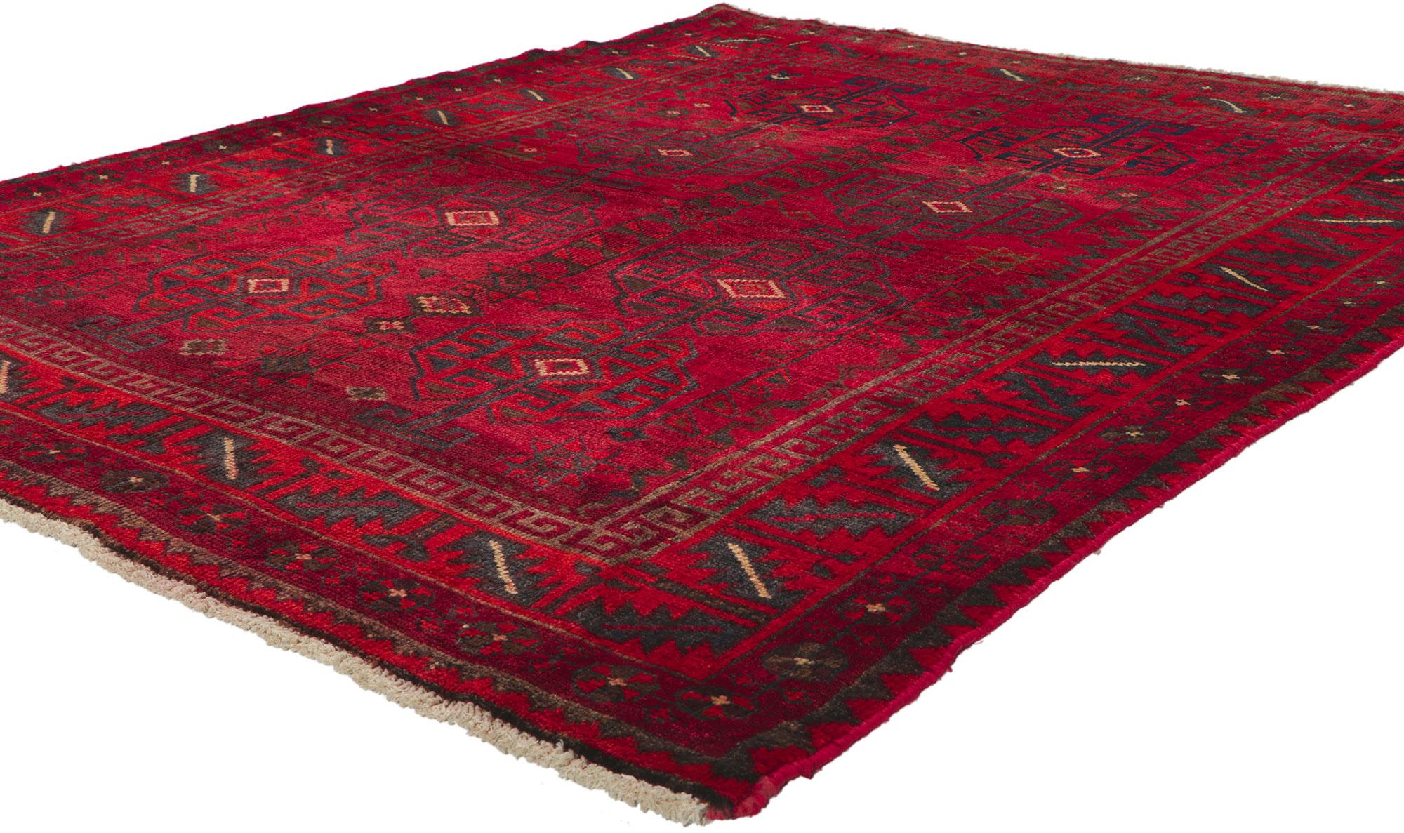 61085 Vintage Turkoman rug, 05'00 x 06'01. Cleverly composed with saturated colors, this hand knotted wool vintage Turkoman rug beautifully embodies Mid-Century Modern style. The abrashed red field features an all-over geometric pattern composed of