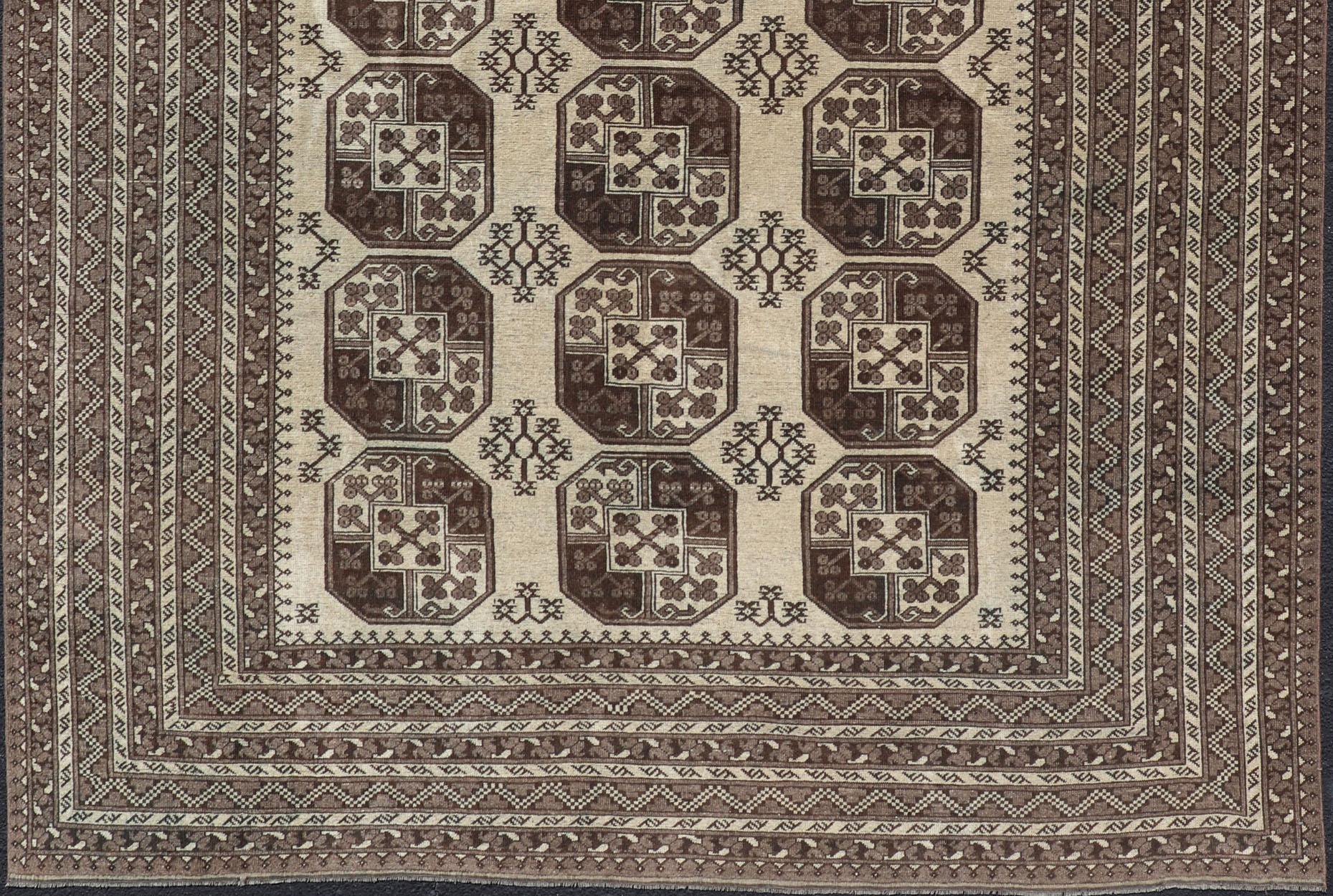 Hand-Knotted Ersari rug with All-Over Sub-Geometric Repeating Gul Design, Keivan Woven Arts; rug EMB-9652-P13542, country of origin / type: Turkestan / Ersari, circa 1940s.

Measures: 8'5 x 11'9. 
 
 This Ersari rug has been hand-knotted in the