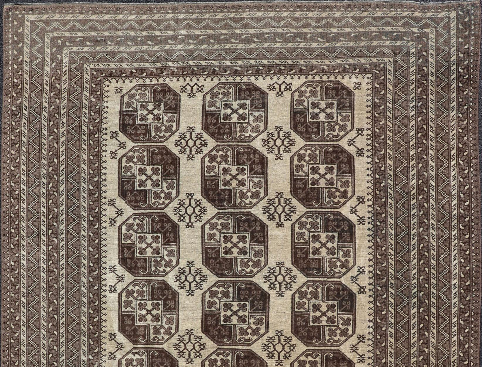 Islamic Vintage Turkomen Ersari Rug in Wool with All-Over Repeating Gul Design For Sale