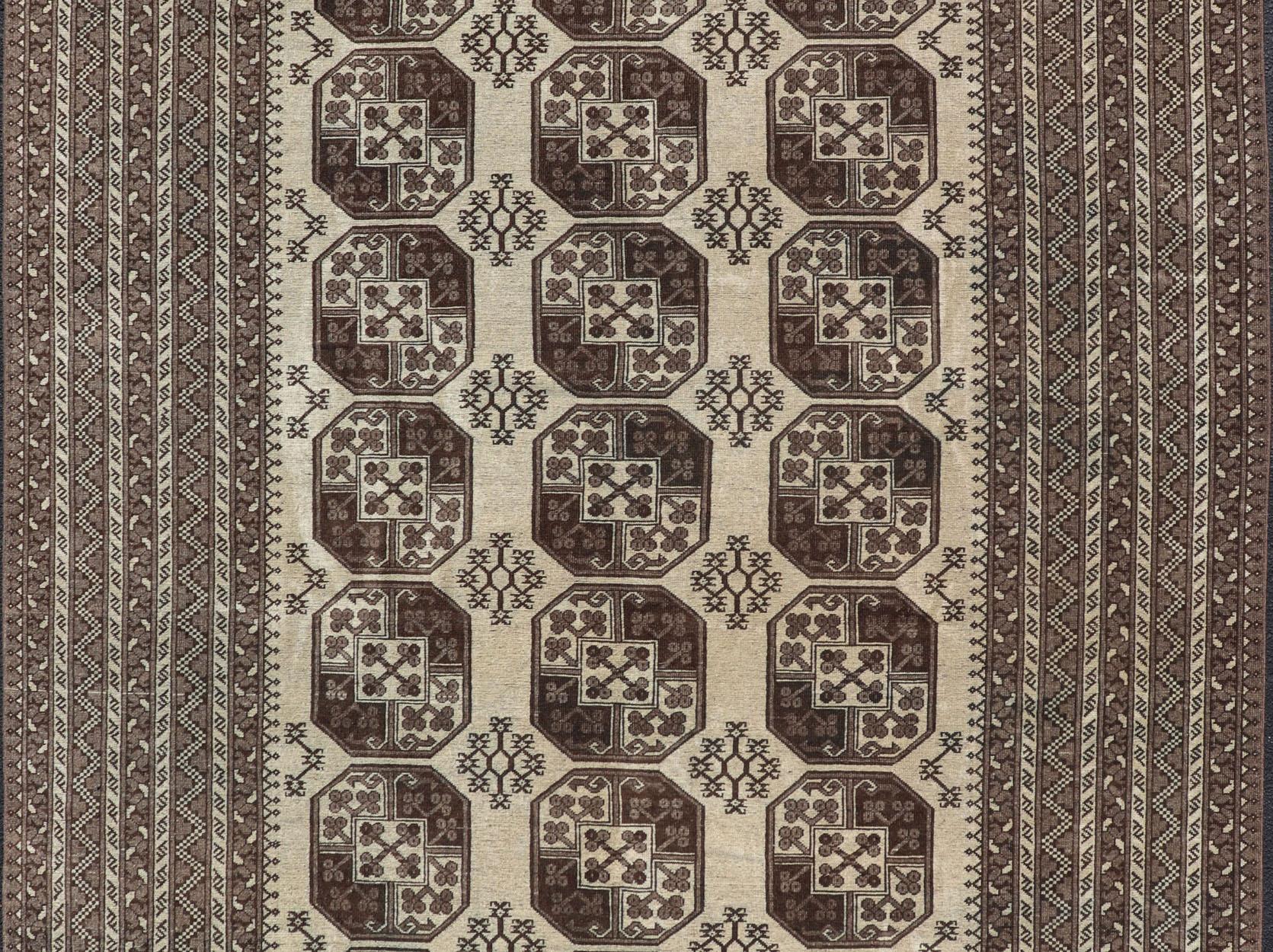 Turkestan Vintage Turkomen Ersari Rug in Wool with All-Over Repeating Gul Design For Sale