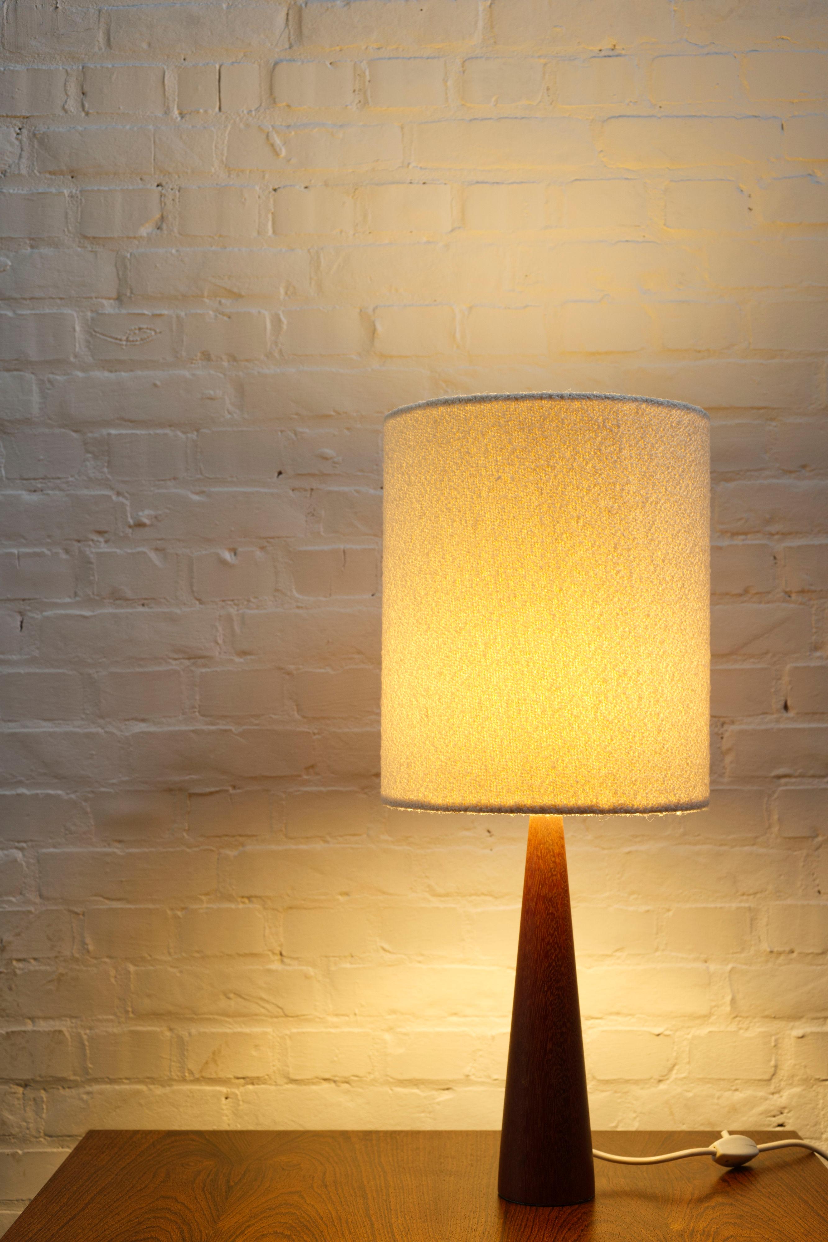Danish Vintage turned teak table lamp with a boucle lampshade