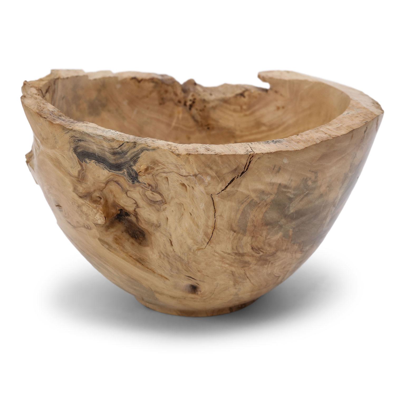Vintage turned wood bowl in an organic modern style with a natural-edged rim.