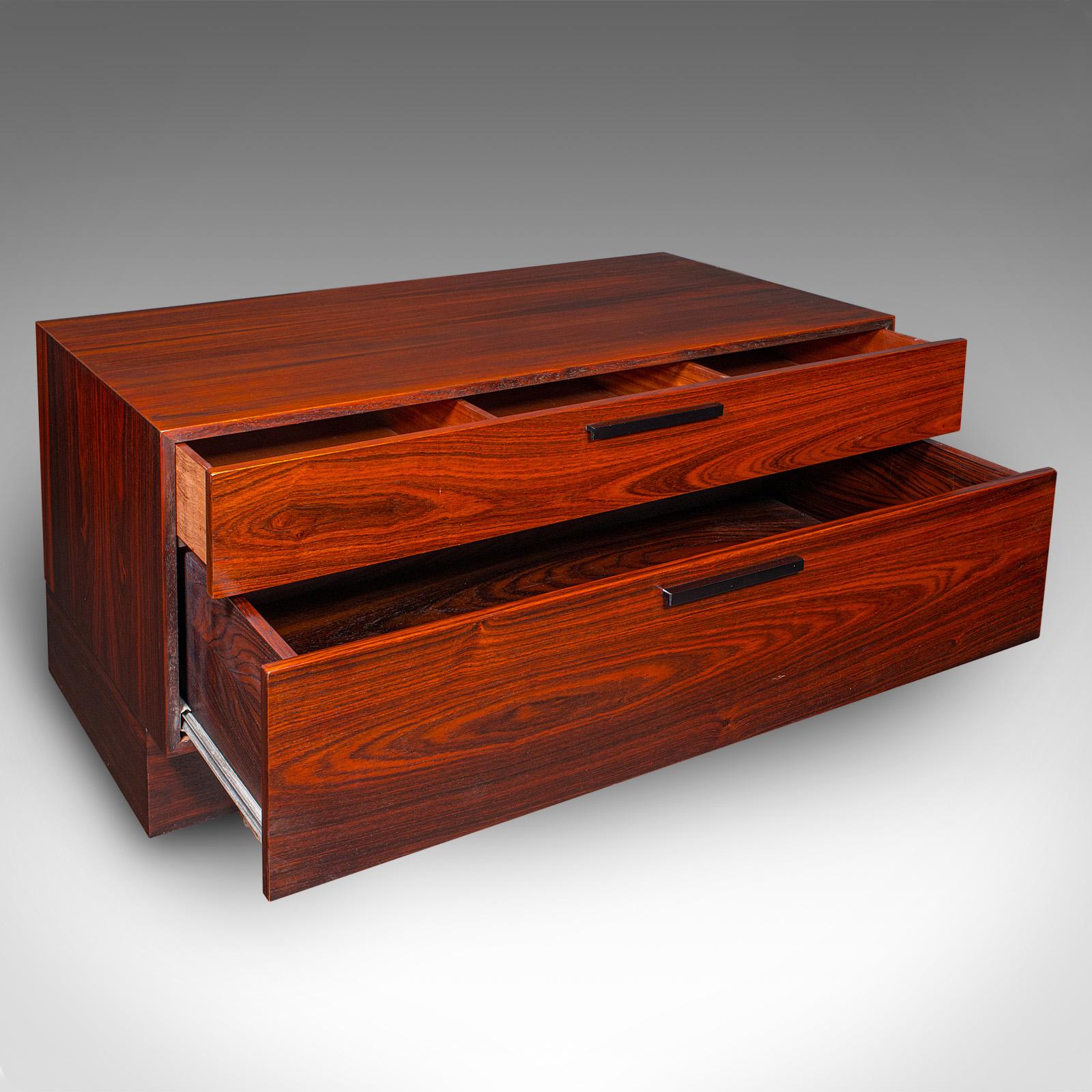 This is a large vintage turntable display stand. A Danish, rosewood media or hifi cabinet with storage drawers by Ib Kofod Larsen for Faarup Møbelfabrik, dating to the mid 20th century, circa 1960

A superb example of mid-century Scandinavian