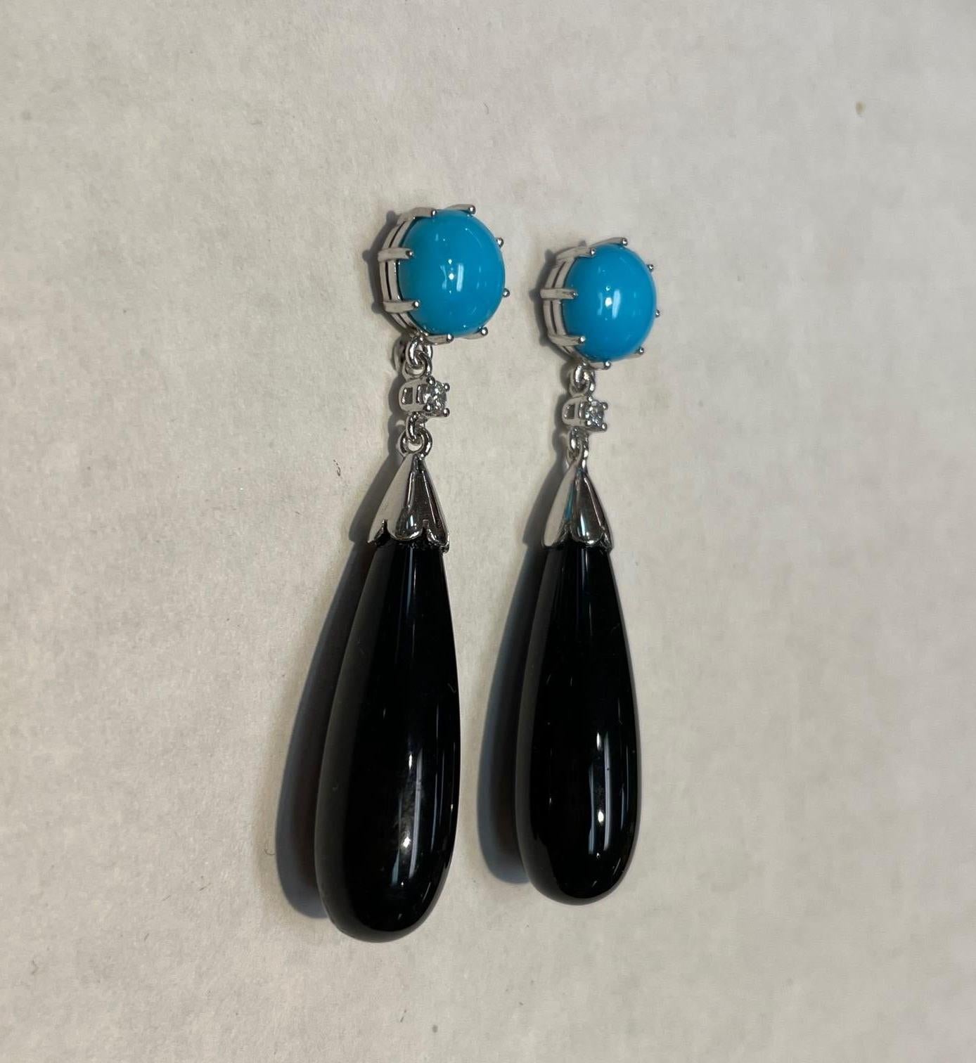 Simply Beautiful! Turquoise, Black Agate and Diamond Gold Drop Earrings. Each earring has a Hand set Turquoise and Diamond top, suspending a teardrop Black Agate. Approx. length of each Earring: 2”. Hand crafted. Stamped 14K. Post and butterfly