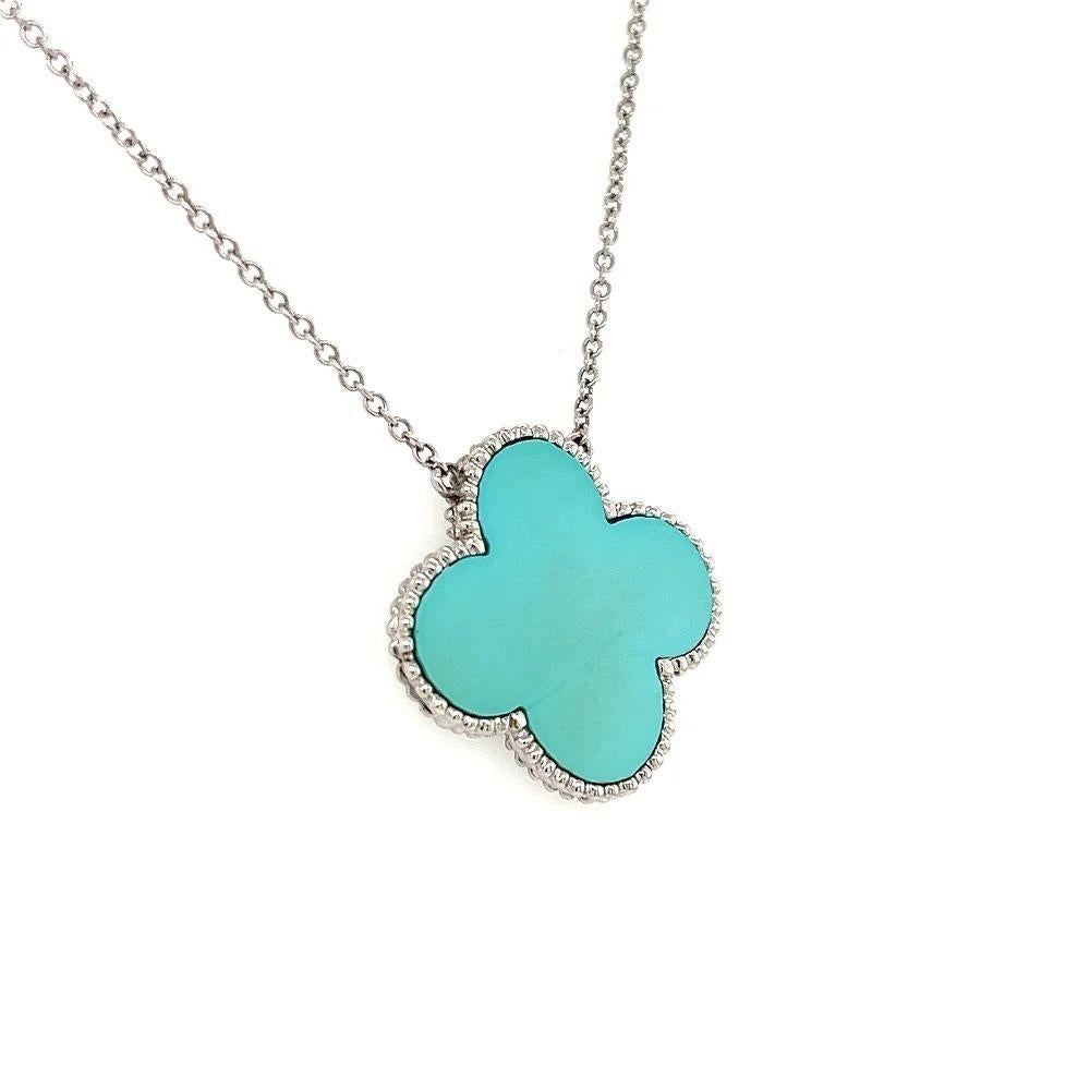 Simply Beautiful! Finely detailed Hand-Crafted 1” Flat Turquoise Gold Pendant Necklace. Featuring a Fabulous Turquoise encased in a delicately Hand-crafted 18K White Gold frame. The necklace measures approx. 18