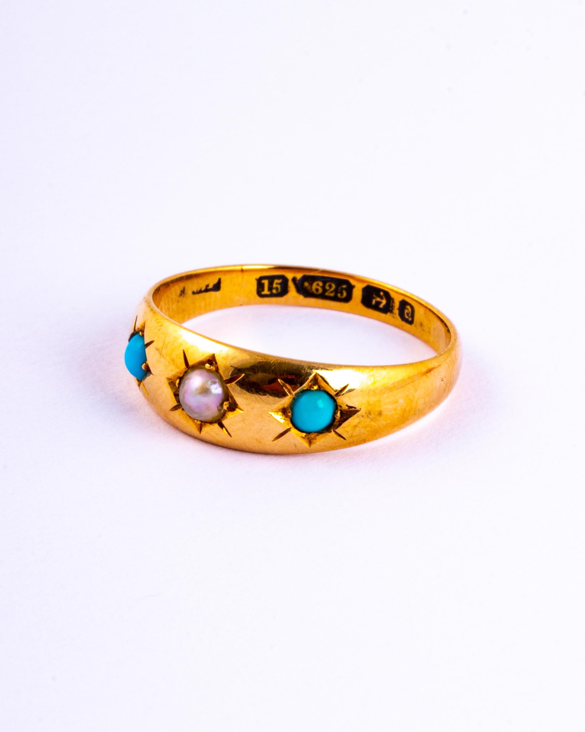 The three stones are set in star settings and are a deep turquoise colour and shimmering white. The ring is modelled in 15ct gold and is made in Birmingham, England.

Ring Size: P or 7 3/4
Band Width: 7mm 

Weight: 3.5g 