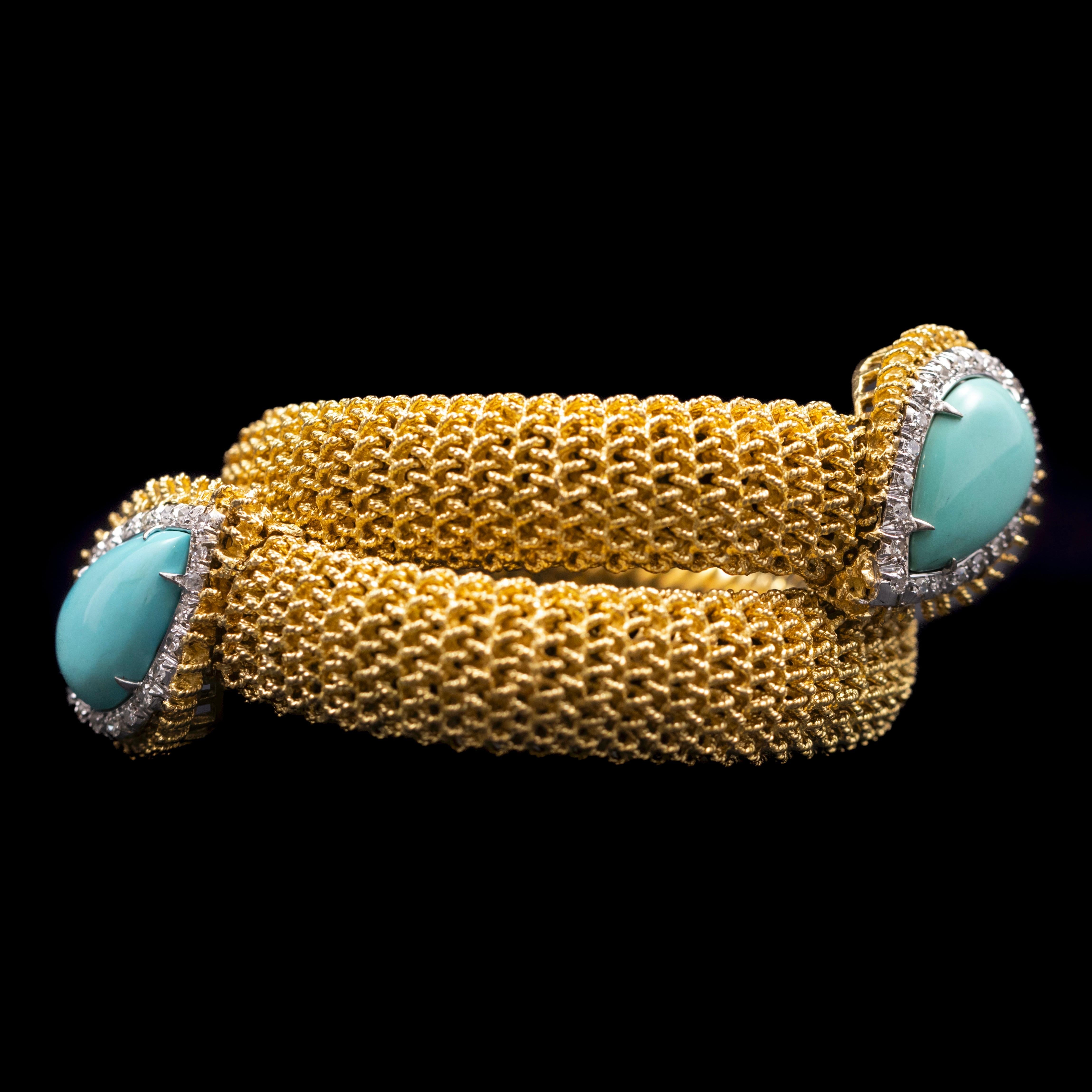 Vintage Turquoise and Diamond Stylized Snake Toi-et-Moi Crossover Bracelet in 19.2K Yellow and White Gold, Portugal, 1960s–1970s.

A bold and sculptural vintage bracelet evoking the elegance of stylized serpentine forms, this Portuguese crossover