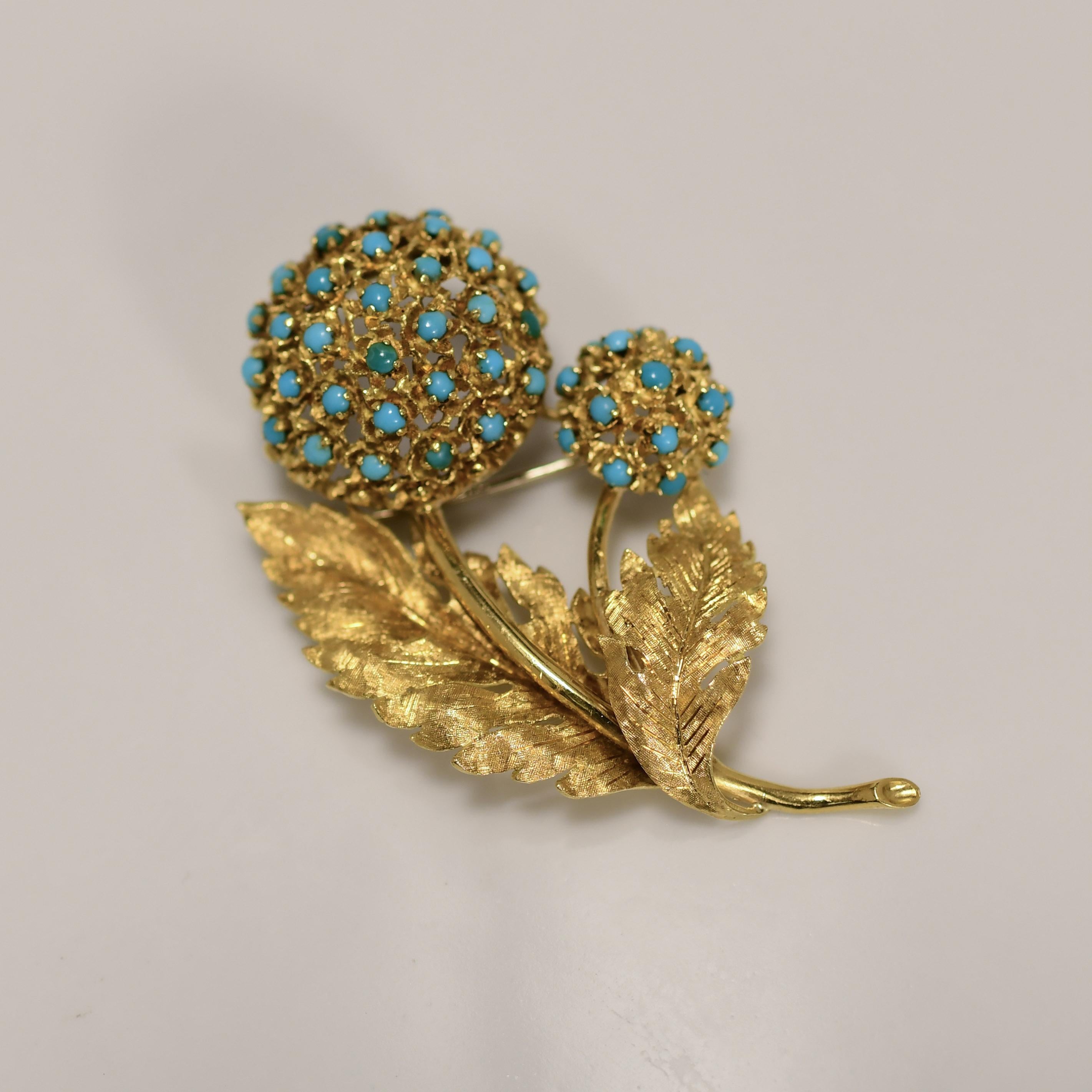 Elevate your style with this alluring 18K Vintage Turquoise Floral Brooch, hallmarked with the prestigious 