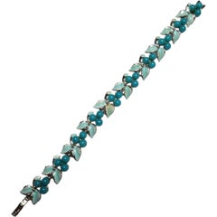 Pulsera vintage de cristal turquesa y hojas de esmalte, estilo Lisner en tono plateado Años 50