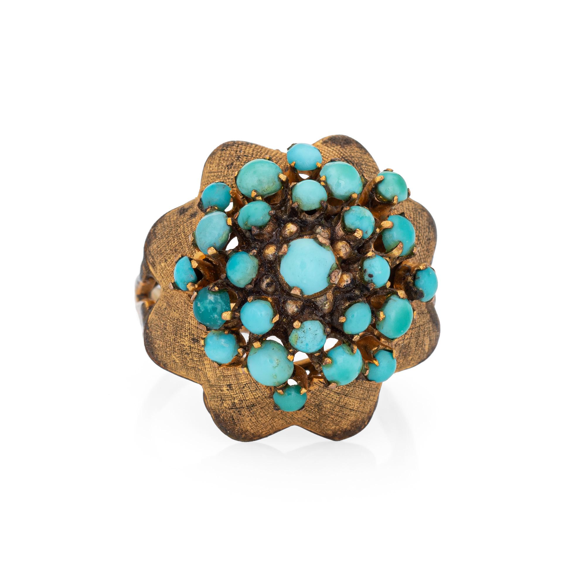 Stylish vintage turquoise harem ring (circa 1960s) crafted in 18 karat yellow gold. 

Cabochon cut turquoise ranges in size from 2mm to 3.5mm. The turquoise is in good condition (note slight color variance to the turquoise due to the age of the