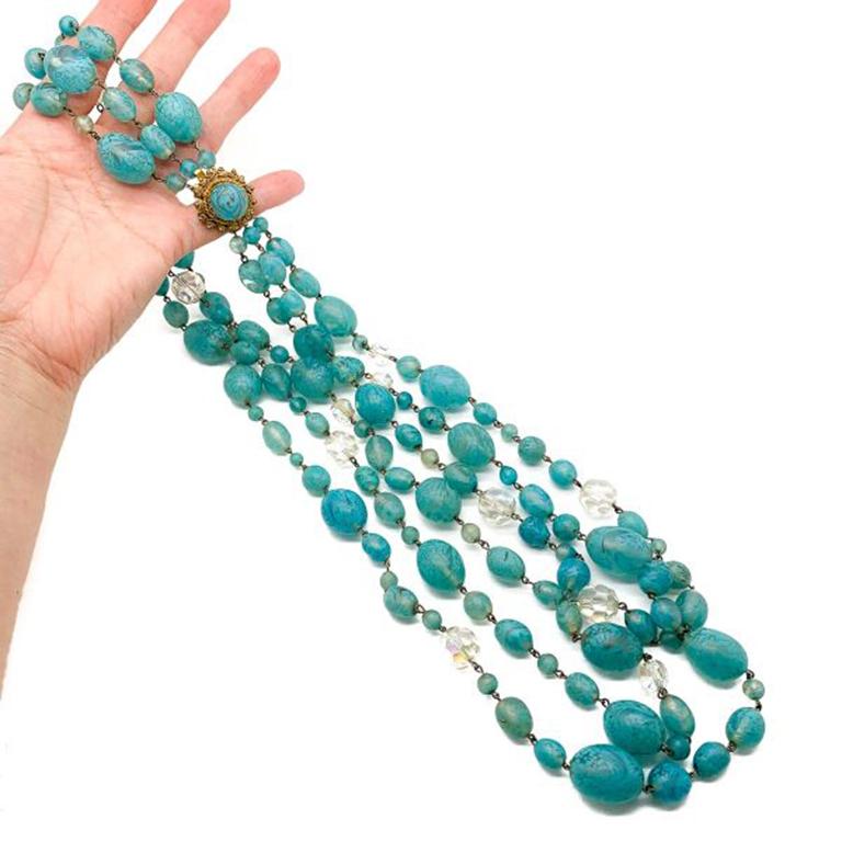 A striking statement Vintage Turquoise Murano Glass Necklace from the 1950s. Featuring three long and impressive, weighty rows of large, beautiful murano glass beads with a satin glass finish, interspersed with faceted crystal aurora borealis beads.