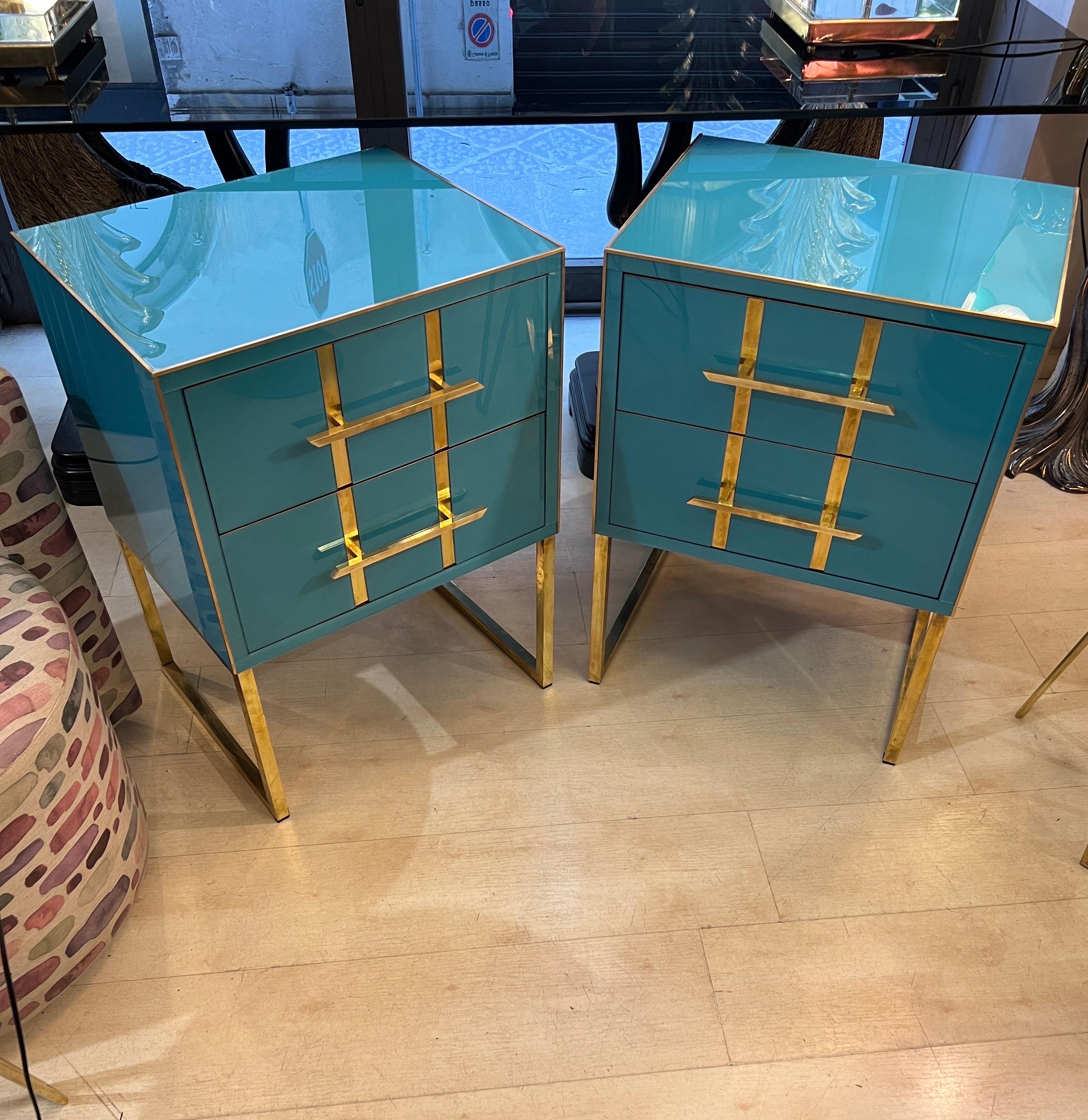 Pait of Vintage Turquoise Opaline Glass Nightstands with two drawers, brass handles, inlays and legs. The inside of the drawers have been covered with grrey velvet.