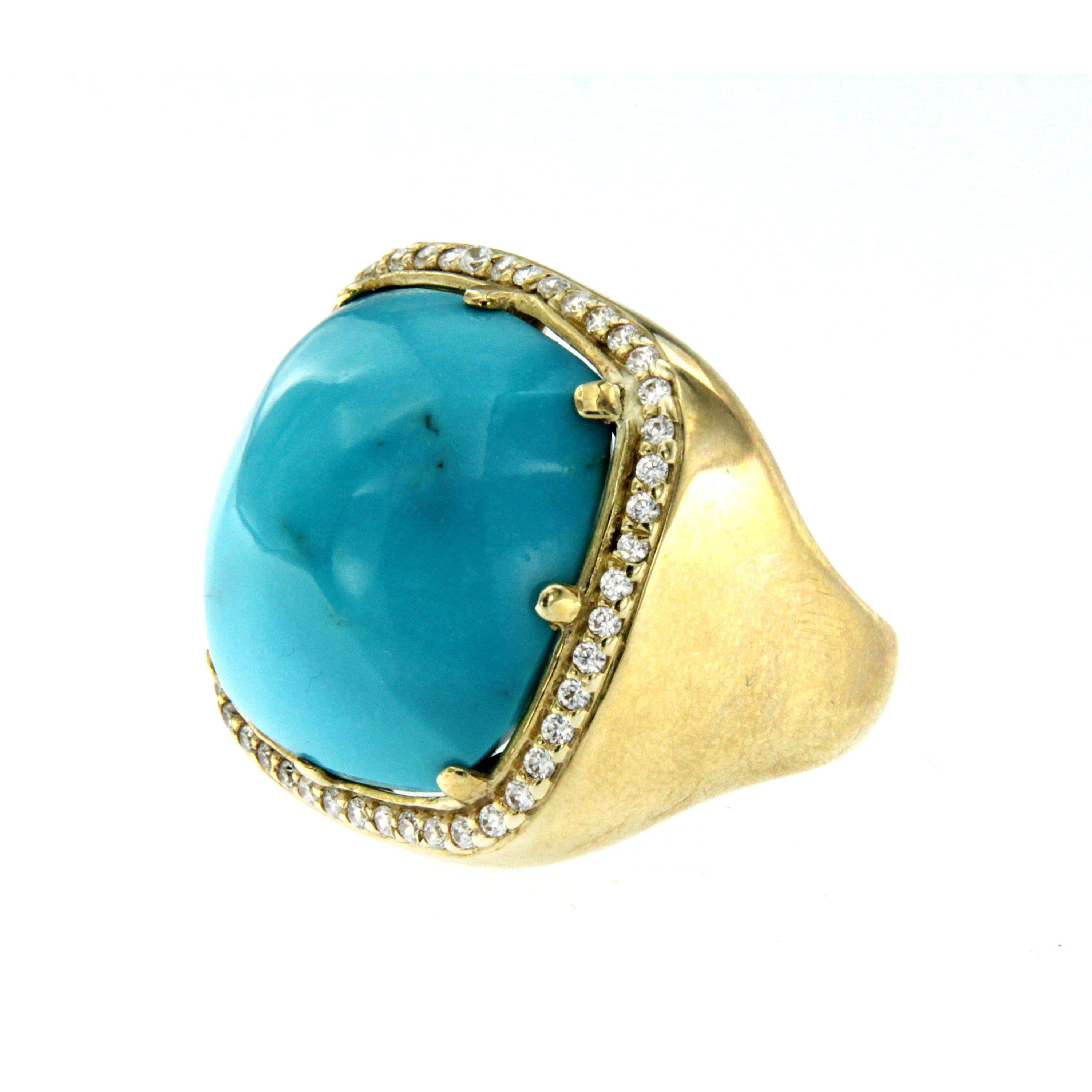 Beautiful ring out from 1980s origin Italy, hand-crafted of solid 9 Kt yellow gold.

The ring features a square cabochon turquoise paste, light blu color and surrounded by approx. 0,60 carat of colorless round brilliant cut diamonds graded G color