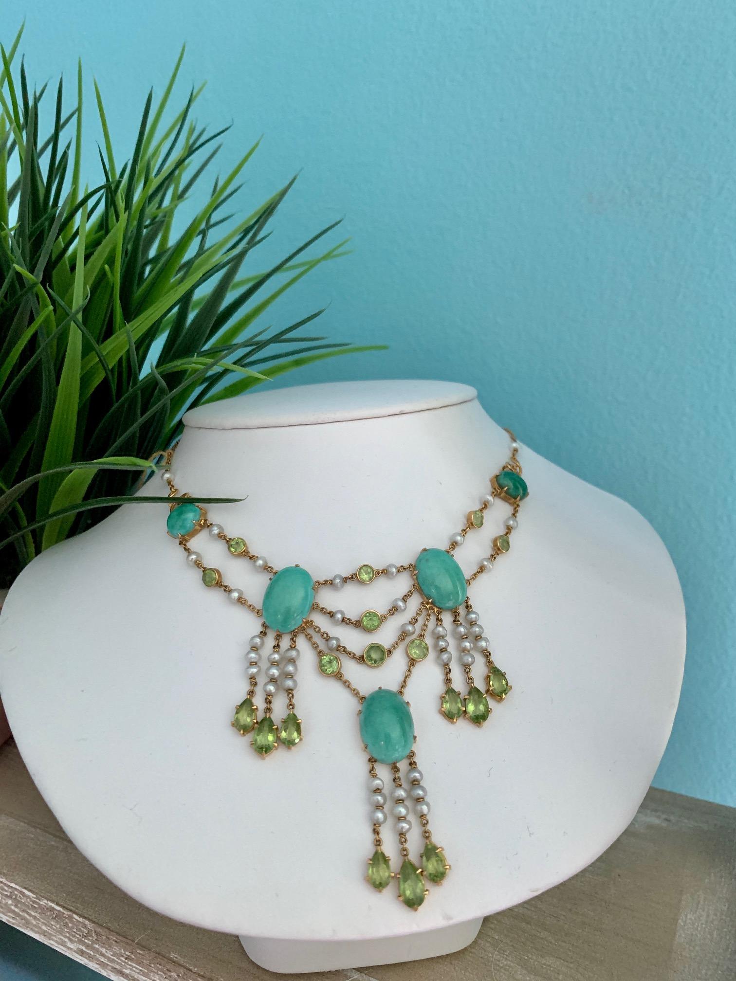 This vintage necklace is a rare find.   The uniqueness and charm is in the combination of turquoise, peridot and pearl in this lovely piece.  I can't imagine the statement this piece would make with a simple white blouse or a LBD.

The necklace is