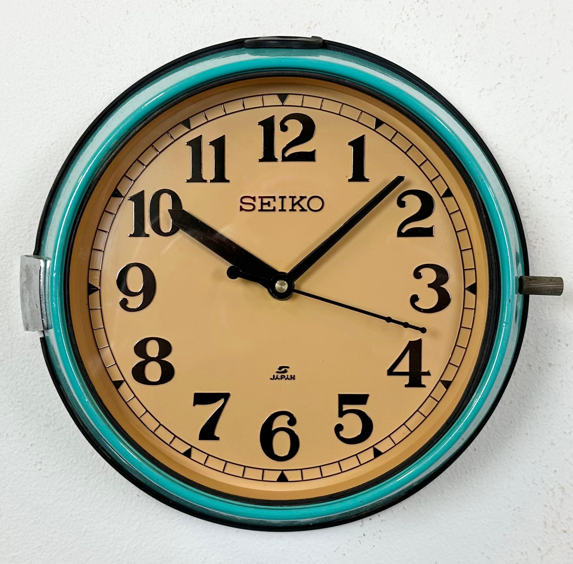 Vintage Seiko maritime slave clock designed during the 1970s and produced till 1990s. These clocks were used on large Japanese tankers and cargo ships. It features a turquoise metal frame, a plastic dial and clear glass cover. This item has been