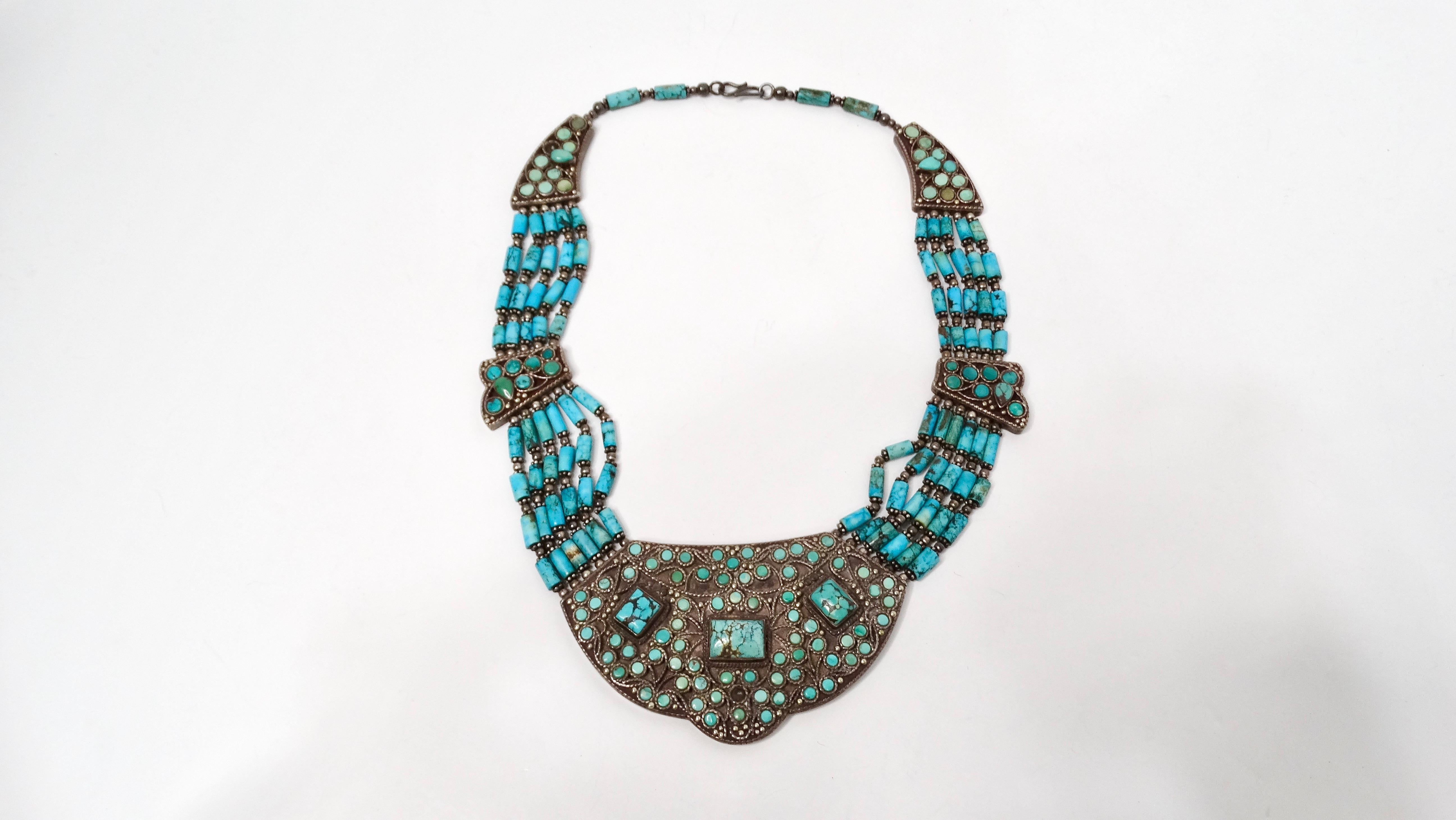 Discover the timeless elegance of this Vintage Turquoise & Sterling Silver Beaded Collar Necklace, a stunning accessory that showcases the rich hues of turquoise and the subtle shine of sterling silver. Each bead is meticulously crafted, creating a