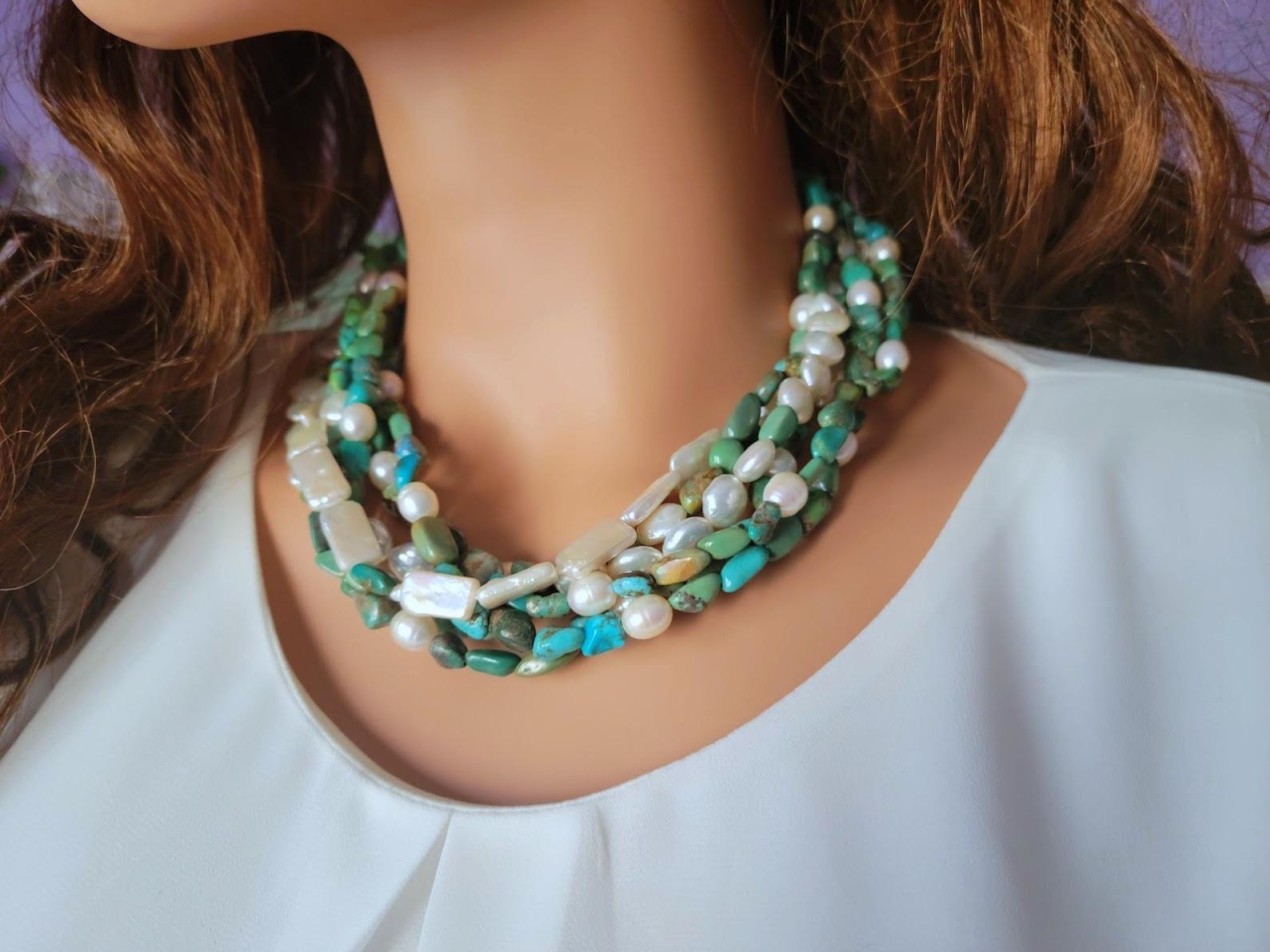A 6-strand graduated beaded necklace of vintage natural turquoise and natural pearl. It's a very exceptional necklace.
The length of the necklace is 17.5 inches (44 cm) + a 3-inch extension chain with pearl bead.
The size of the turquoise irregular