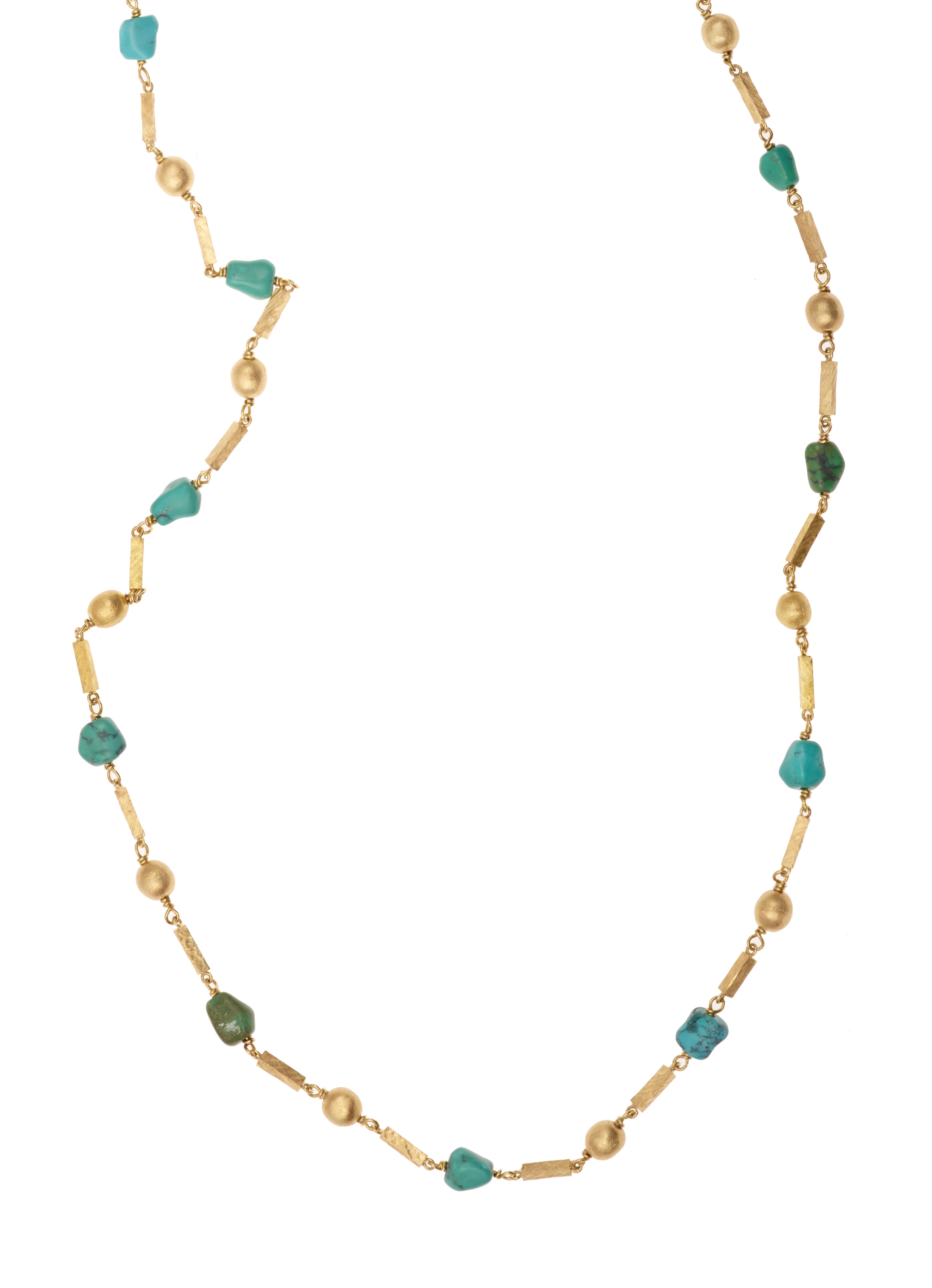 Long yellow frosted gold necklace with alternating turquoise, gold balls and rectangles. 

Length: 82 cm (32 inches)

Number of turquoise stones: 17

Number of gold balls: 18

Number of gold rectangles: 36

Ring clasp.

18 carats yellow gold,