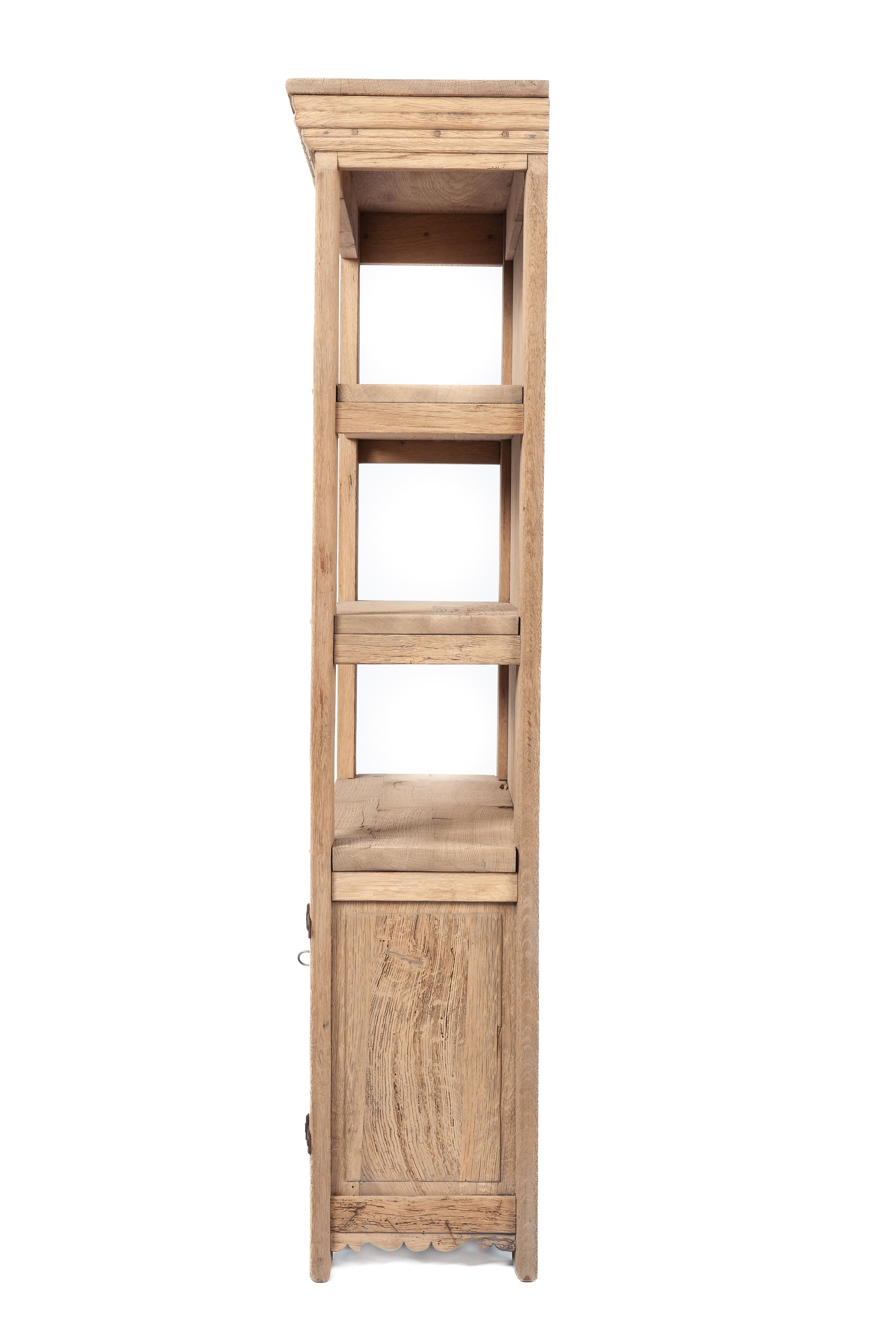 20th Century Vintage two-door stripped solid oak bookcase by Piet Rombouts & Sons, 1960s For Sale