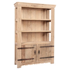 Vintage two-door stripped solid oak bookcase by Piet Rombouts & Sons, 1960s