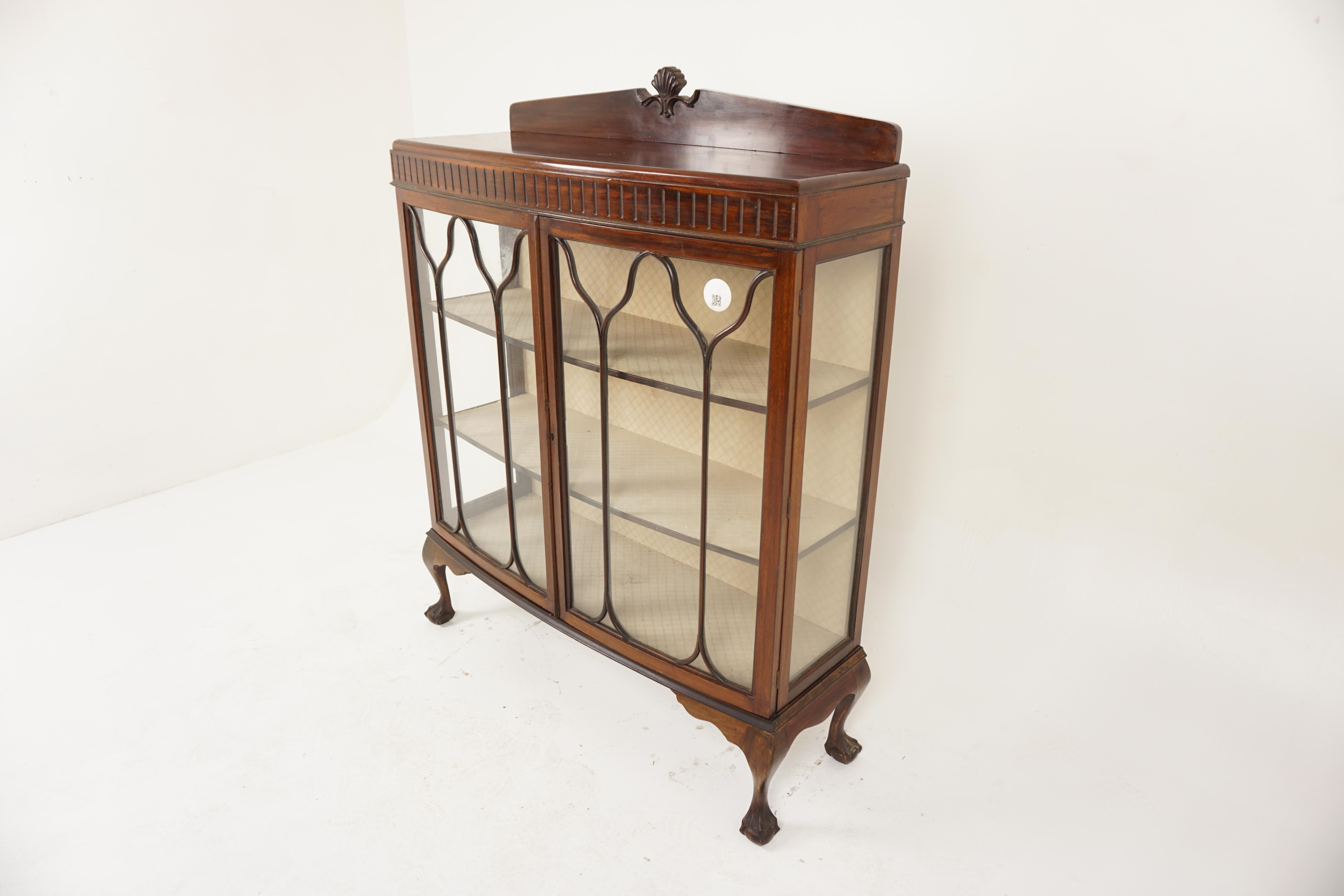 Vintage Two Door Walnut China Cabinet, Display Cabinet, Scotland 1930, H1009

Solid Walnut
Original finish
Carved pediment on back
Bow front top with moulded edge
Carved frieze underneath
Pair of original glass doors with shaped design mouldings to