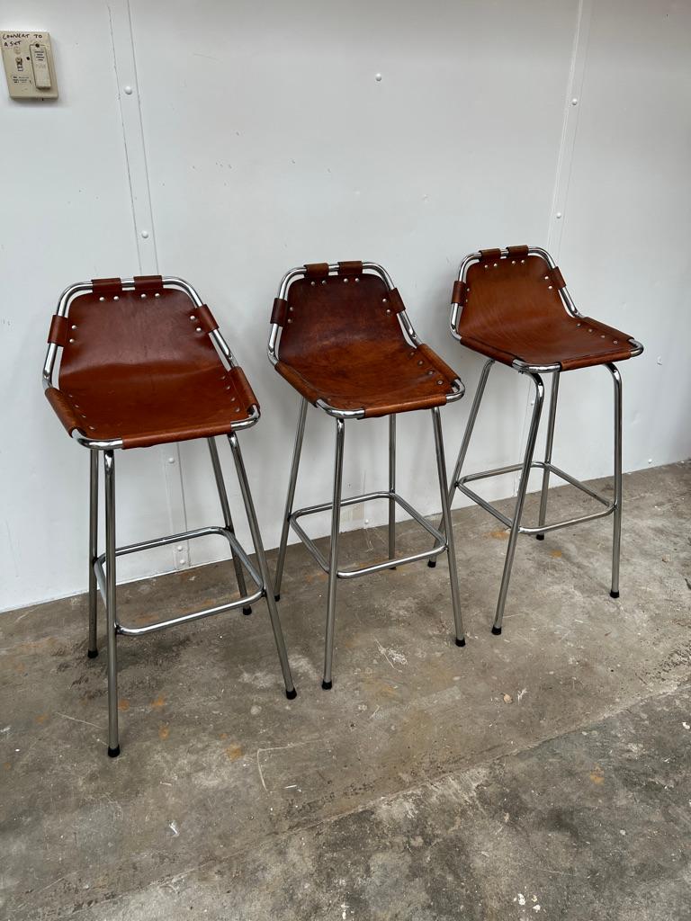 These are the rarest stools by Charlotte Perriand available!

Sought after 3x leather Charlotte Perriand stools for Les Arcs, 1960. 

Three Charlotte Perriand stools in France, stunning stools very unusual and sought after, 

Stunning stools very